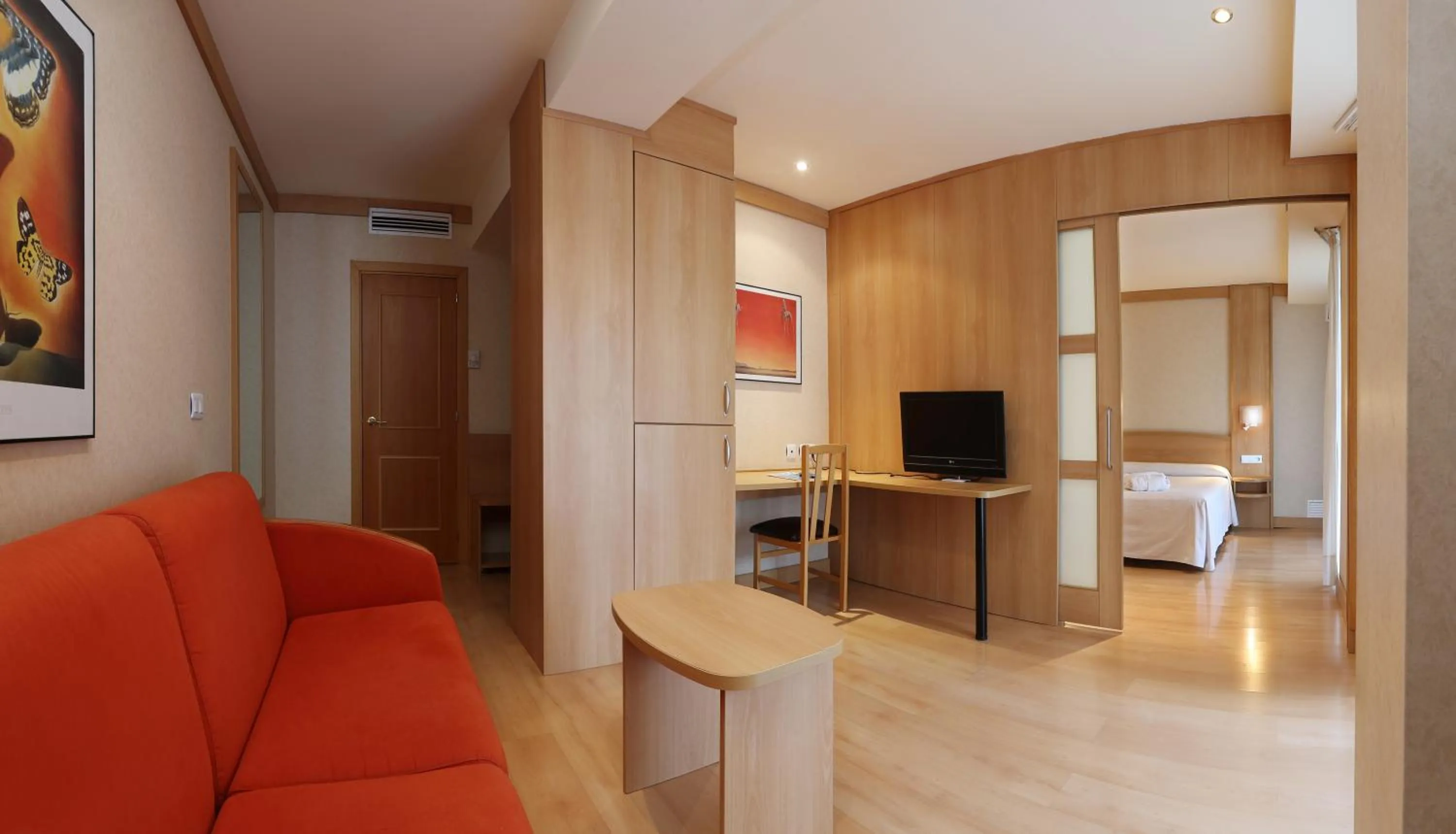 Living room, Bed in Hotel Guitart Central Park Aqua Resort