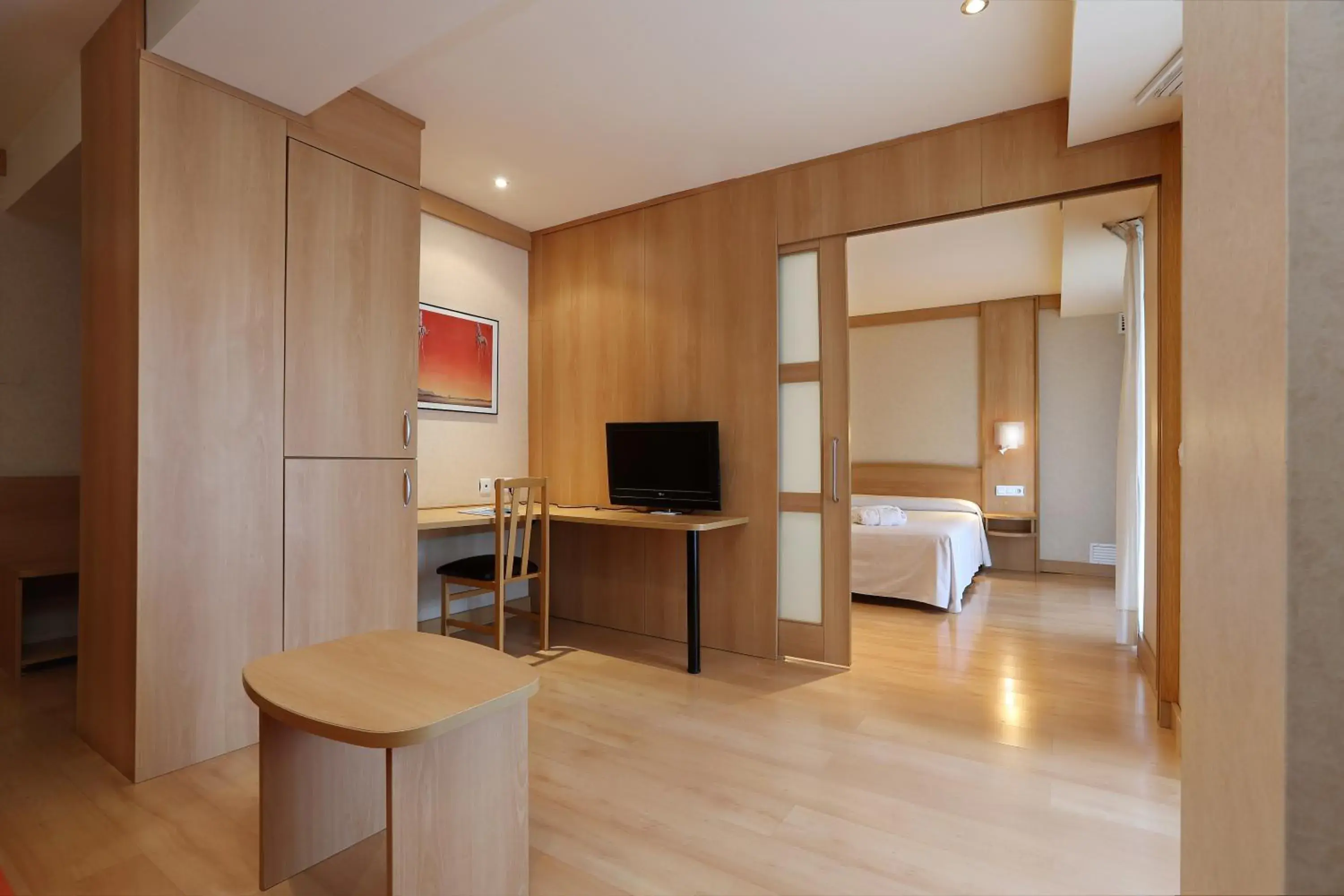 Living room, Bed in Hotel Guitart Central Park Aqua Resort Living room, Bed in Hotel Guitart Central Park Aqua Resort