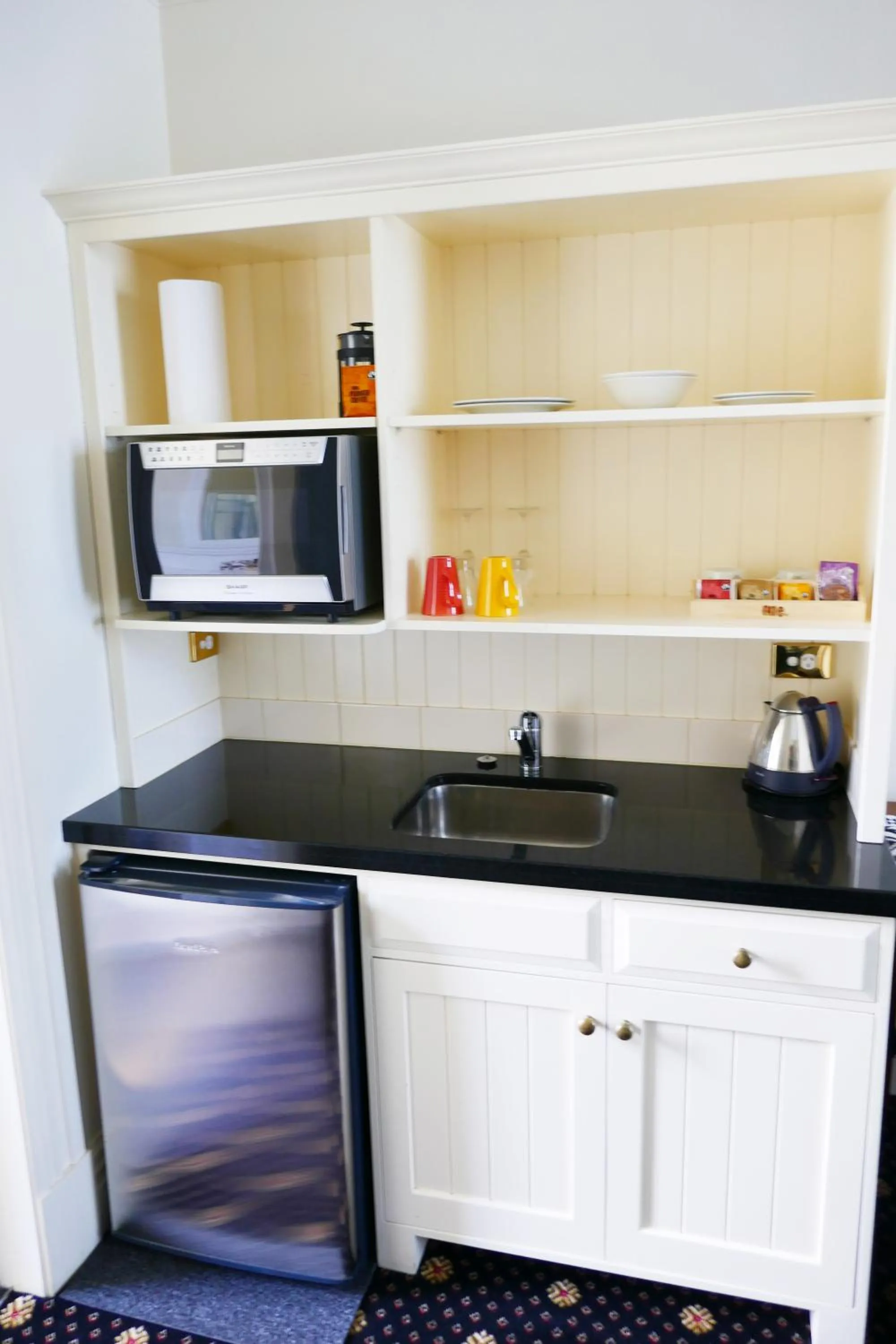 Kitchen or kitchenette in Highland House Boutique Hotel