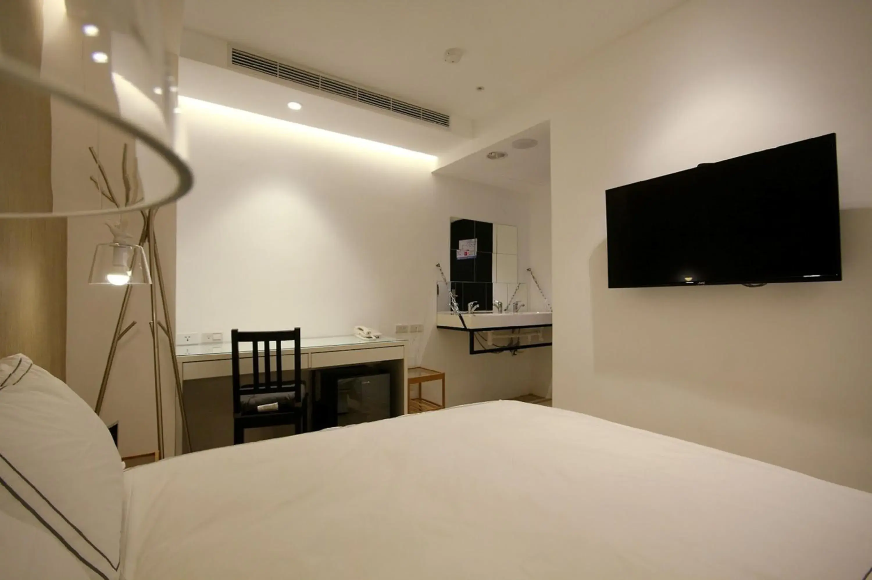 Bed in Mini West Hotel Bed in Mini West Hotel