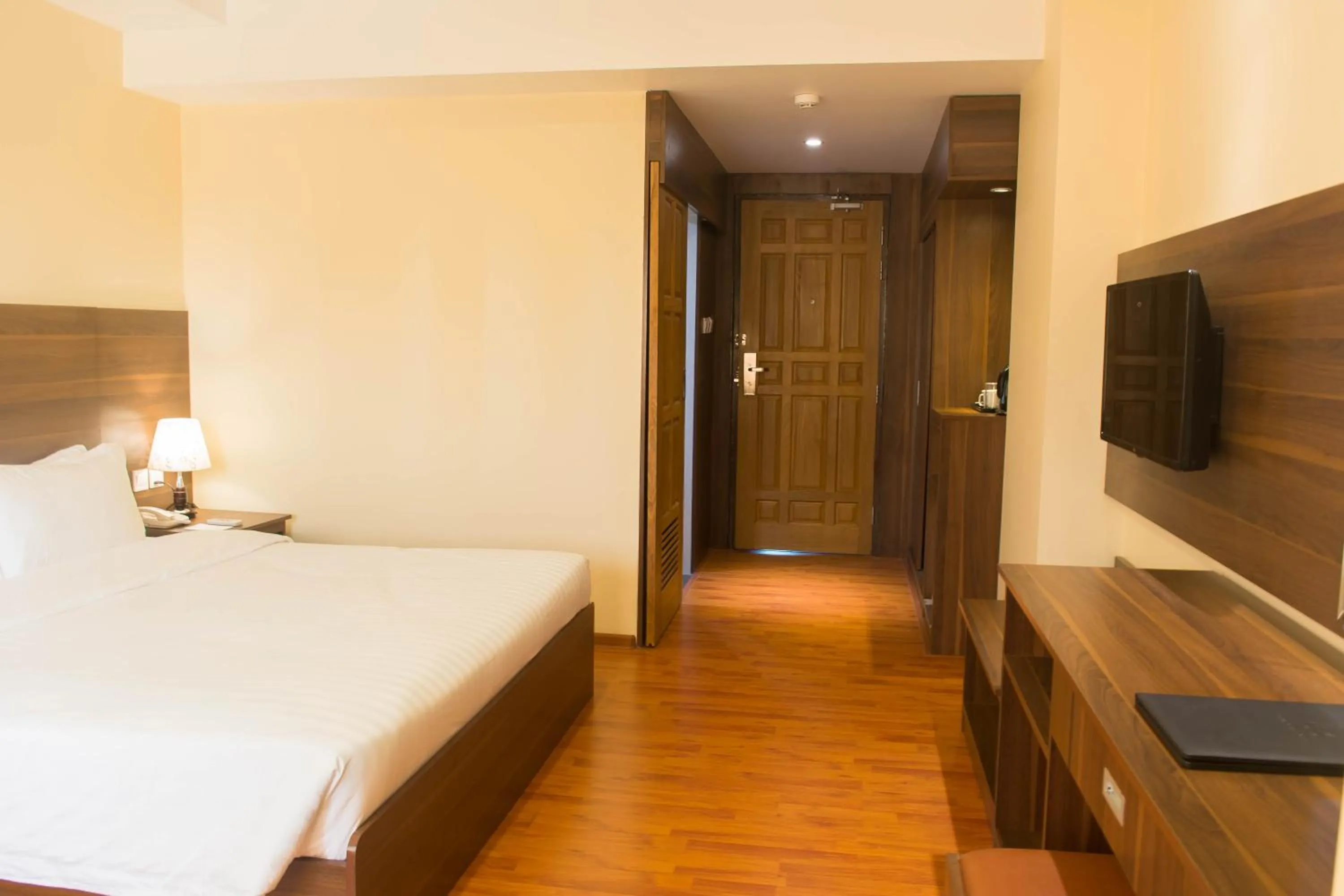 Bedroom in Silver Green Hotel