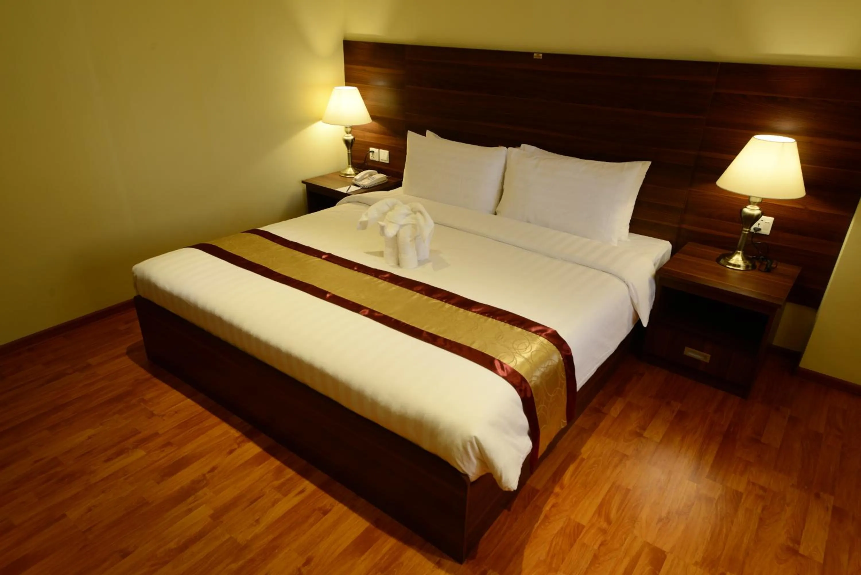 Bedroom in Silver Green Hotel