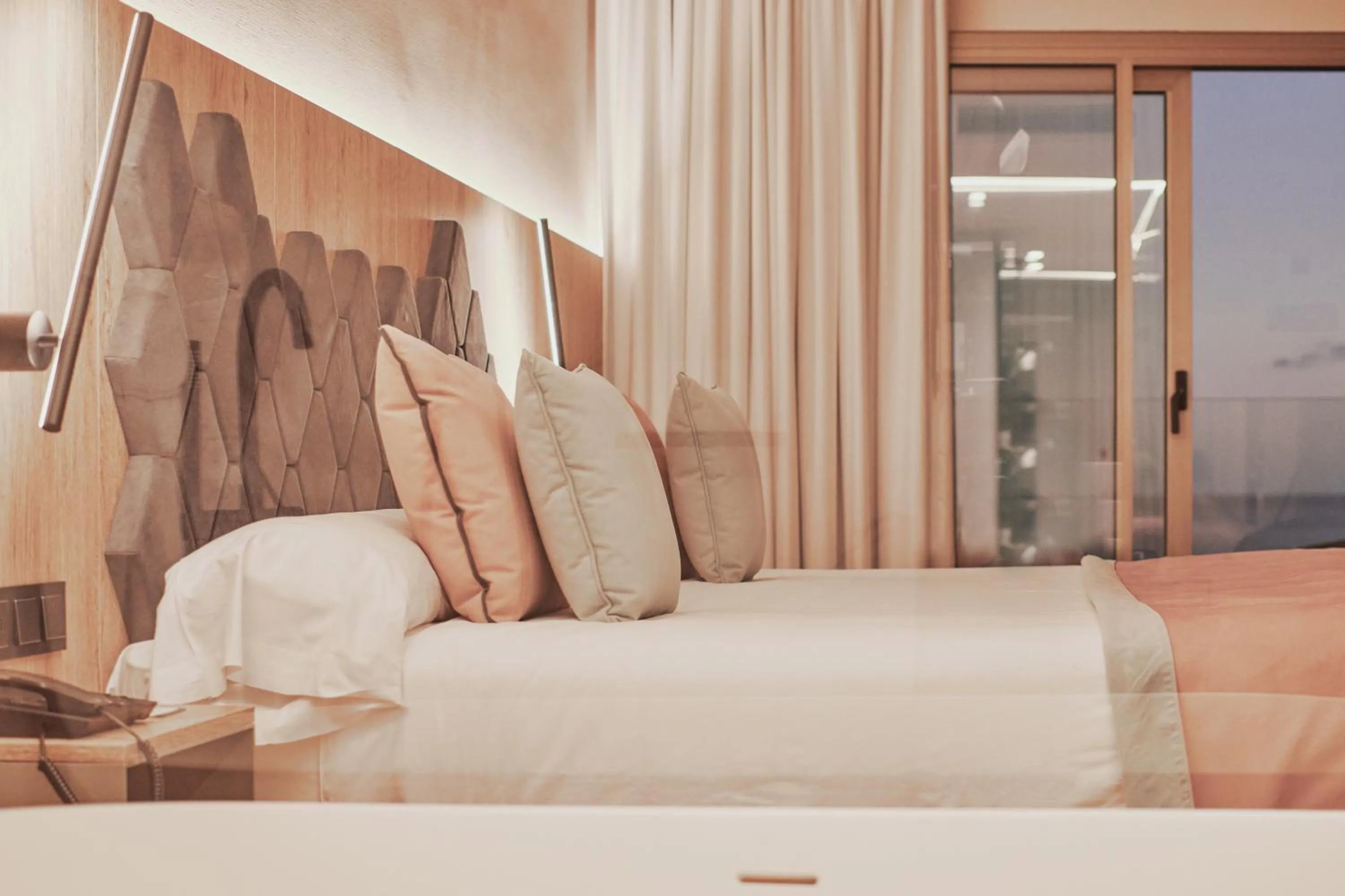 Bed in Gloria Palace San Agustín Thalasso & Hotel