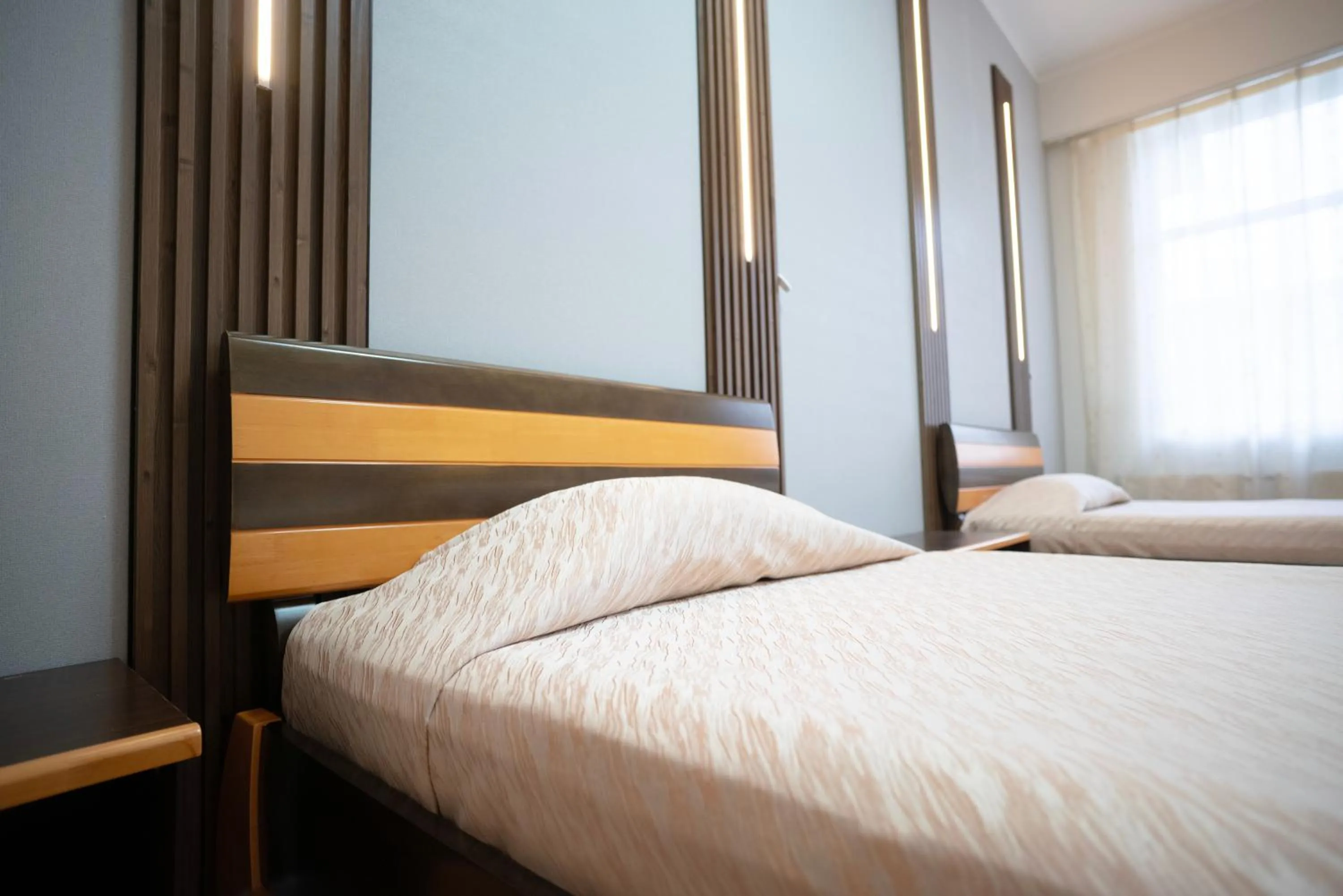 Bed in Tsolmon's Serviced Apartments