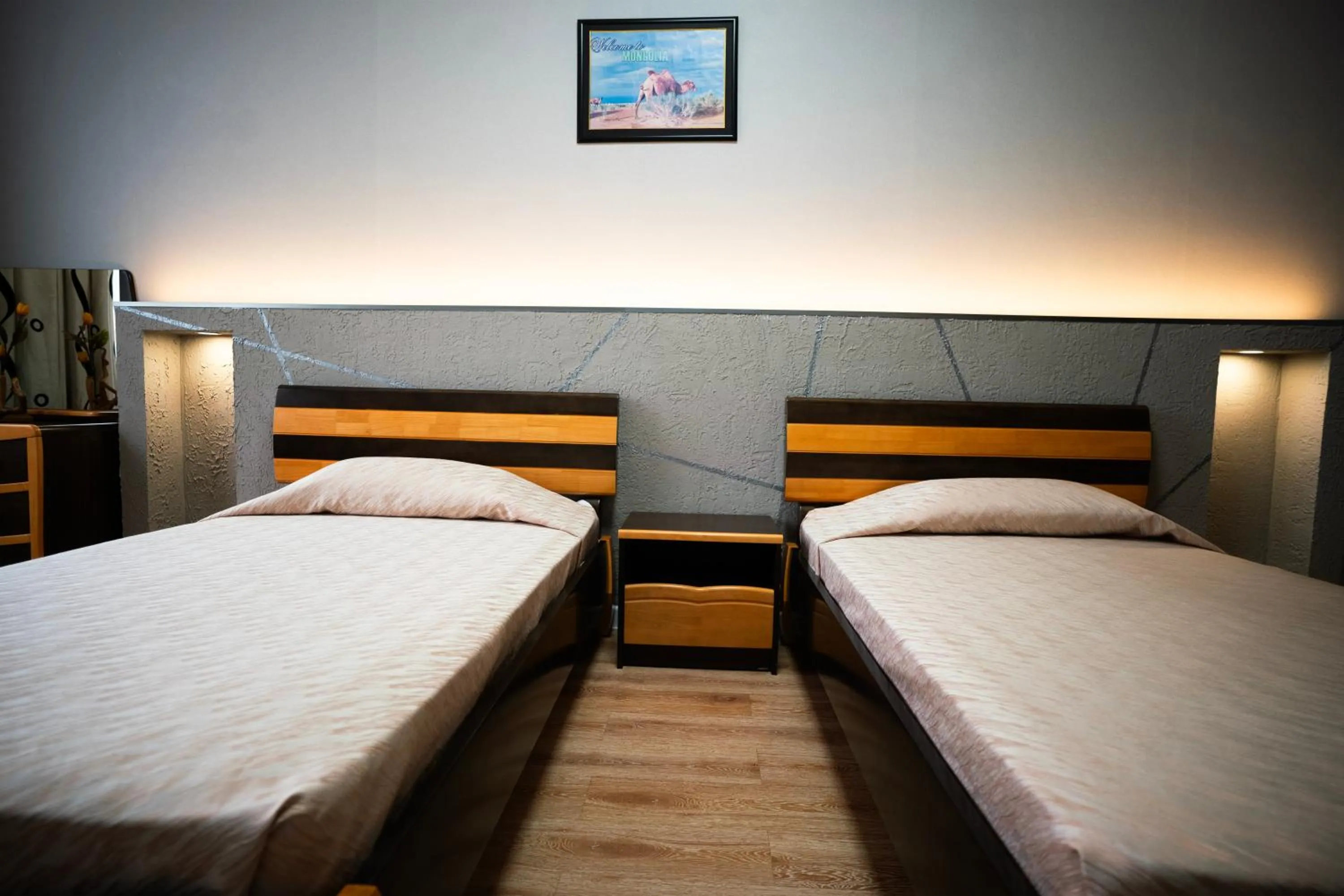 Bed in Tsolmon's Serviced Apartments