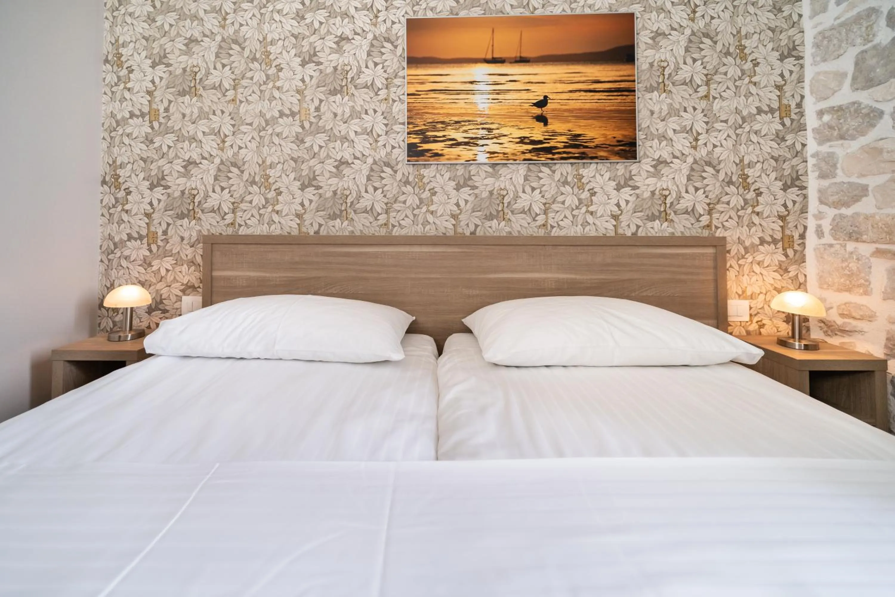 Bed in Tifani Luxury Rooms 2