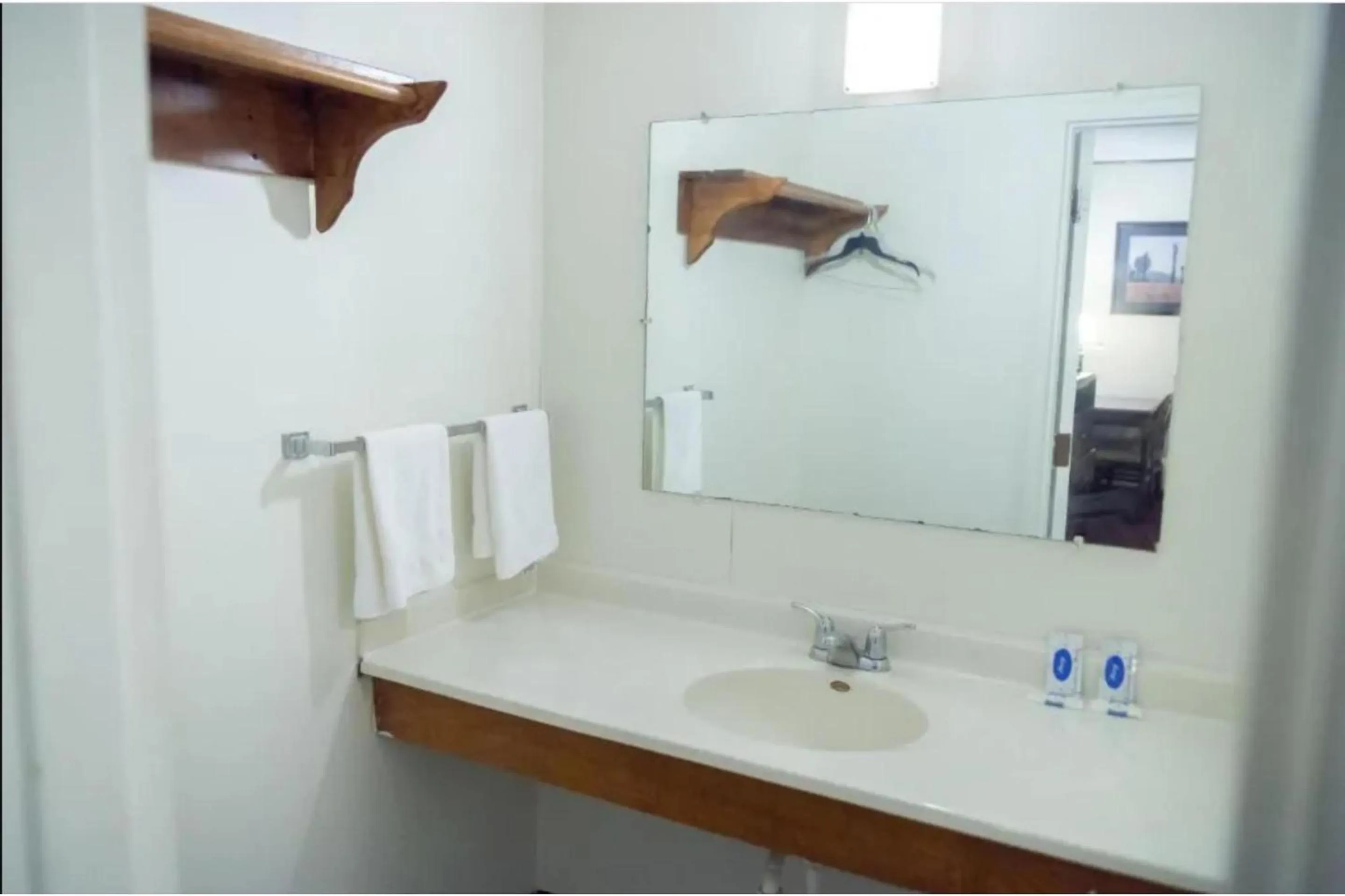 Bathroom in Marshall Lodge By OYO Hwy 65