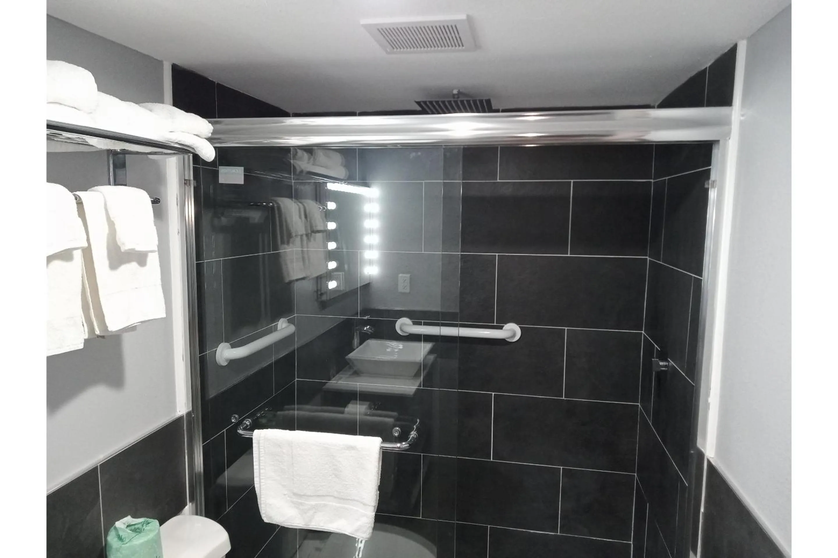 Bathroom in Marshall Lodge By OYO Hwy 65