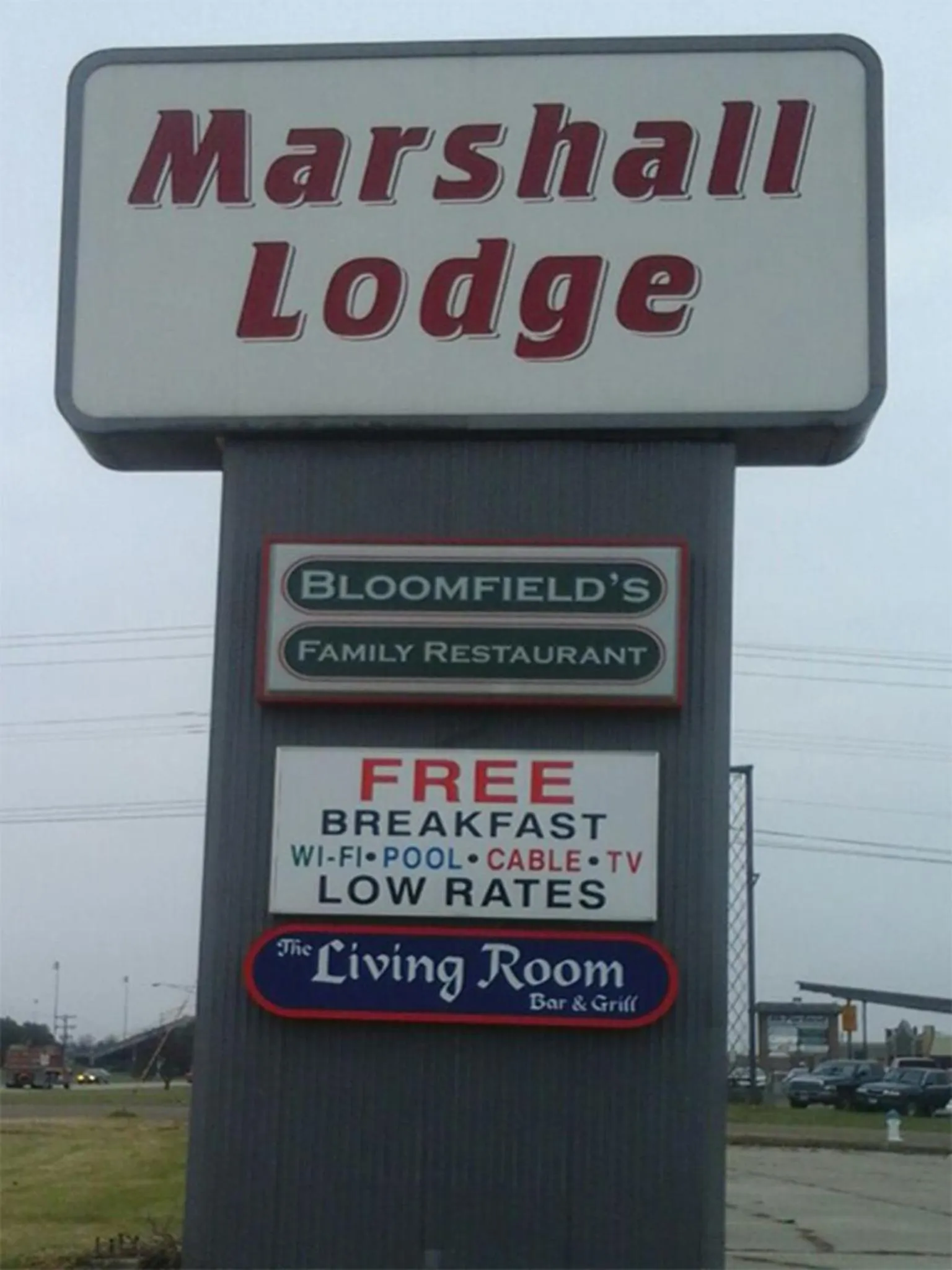 Property logo or sign in Marshall Lodge By OYO Hwy 65