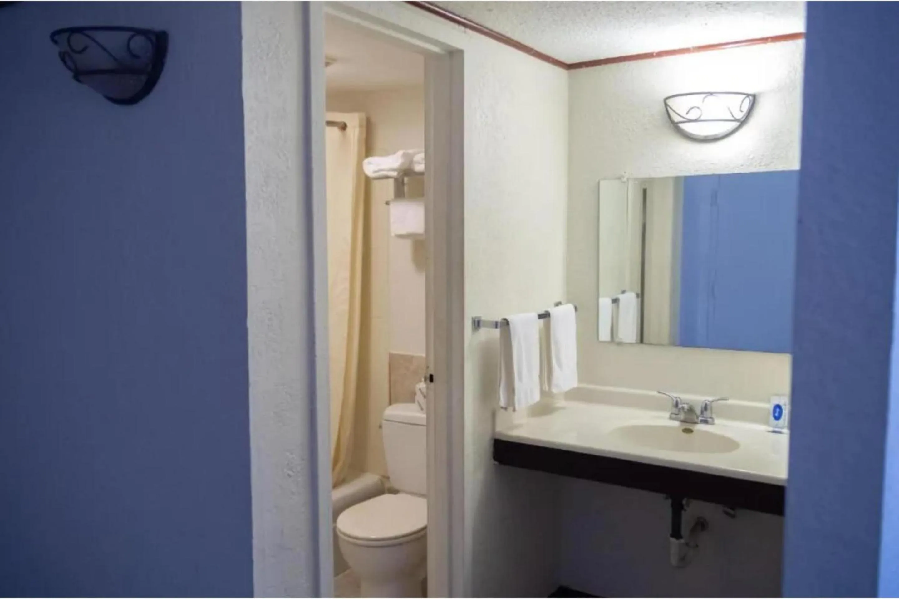 Bathroom in Marshall Lodge By OYO Hwy 65