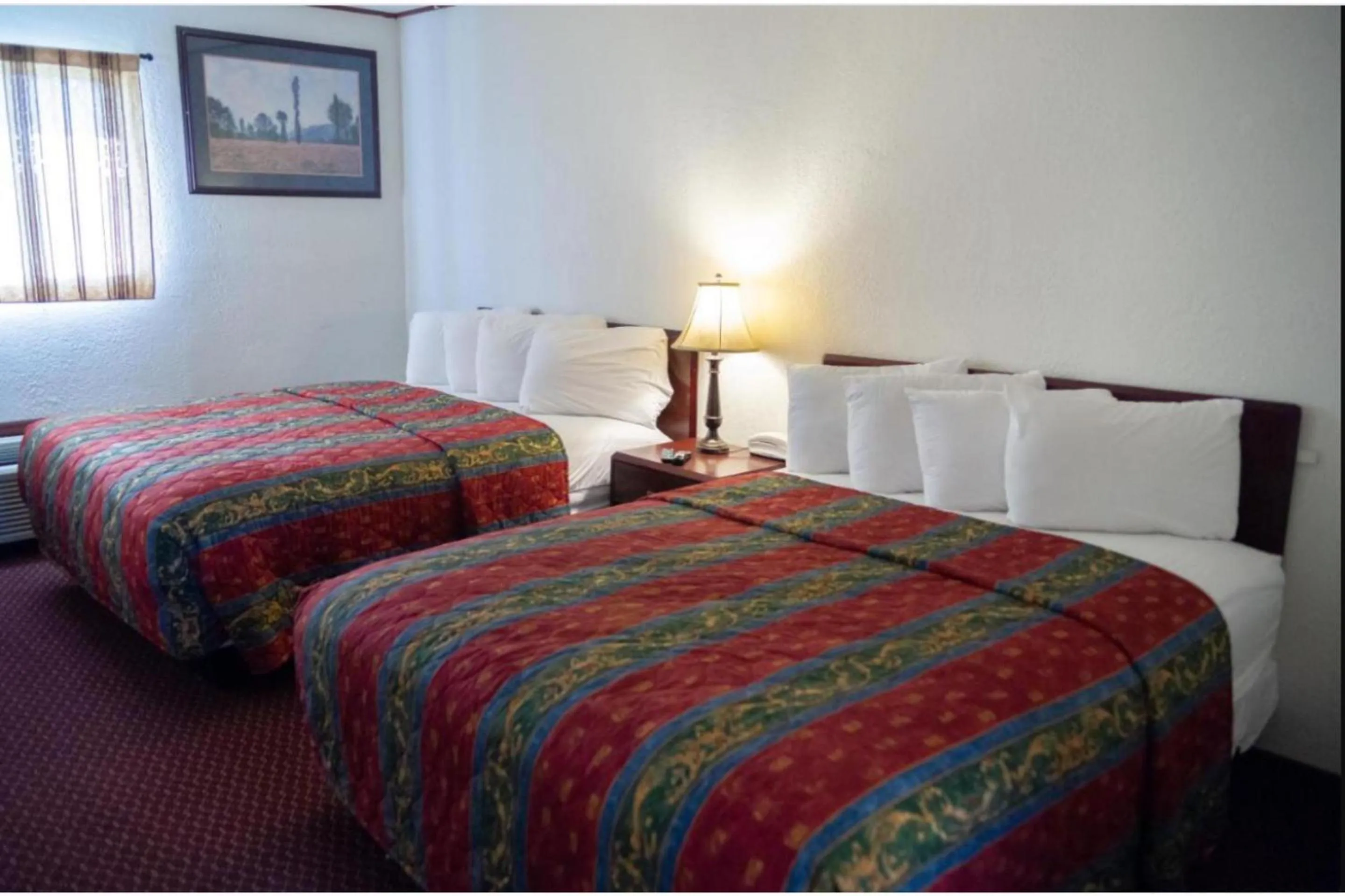 Bedroom, Bed in Marshall Lodge By OYO Hwy 65