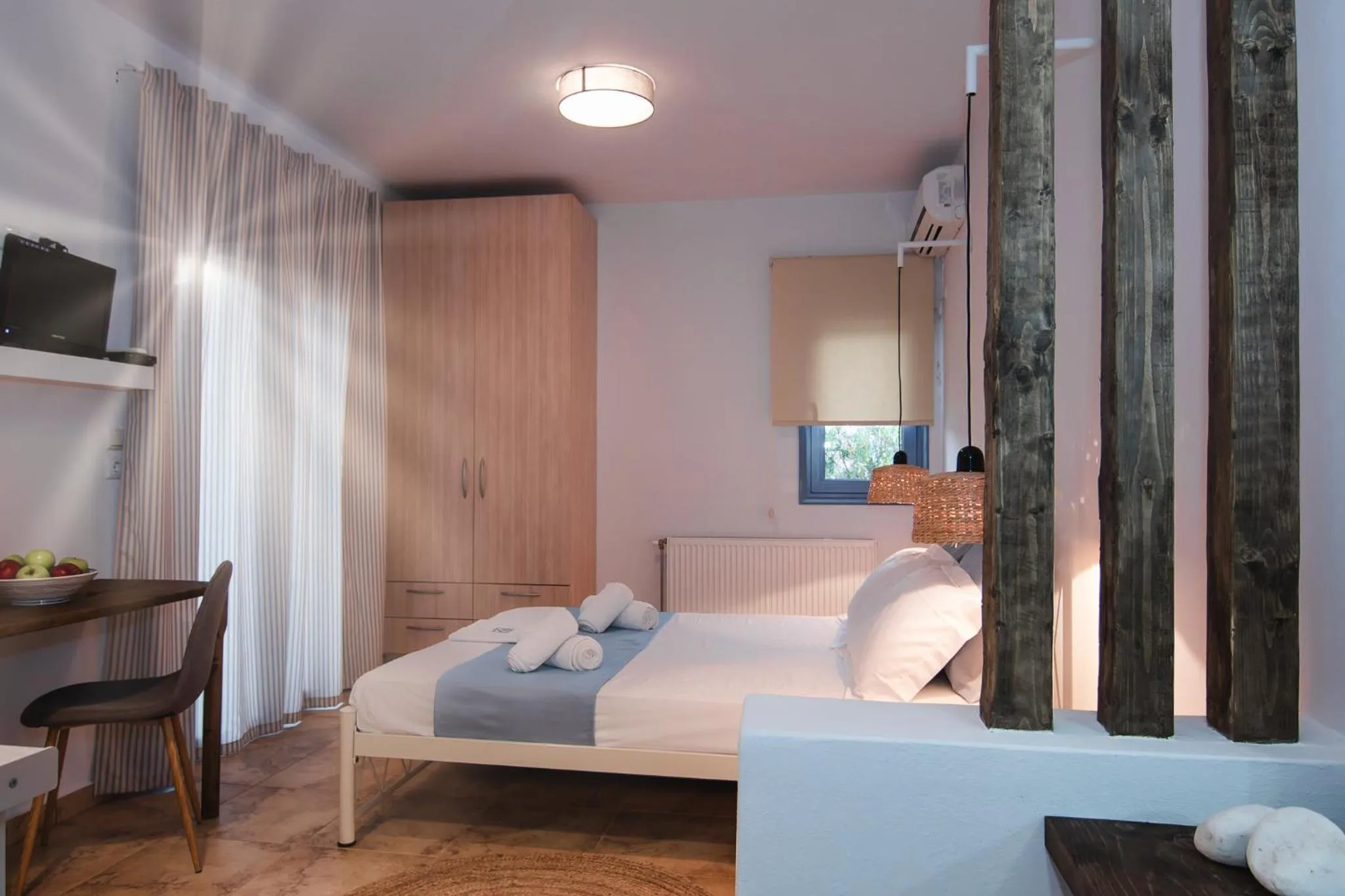 Bed in Kallisti Studios & Apartments