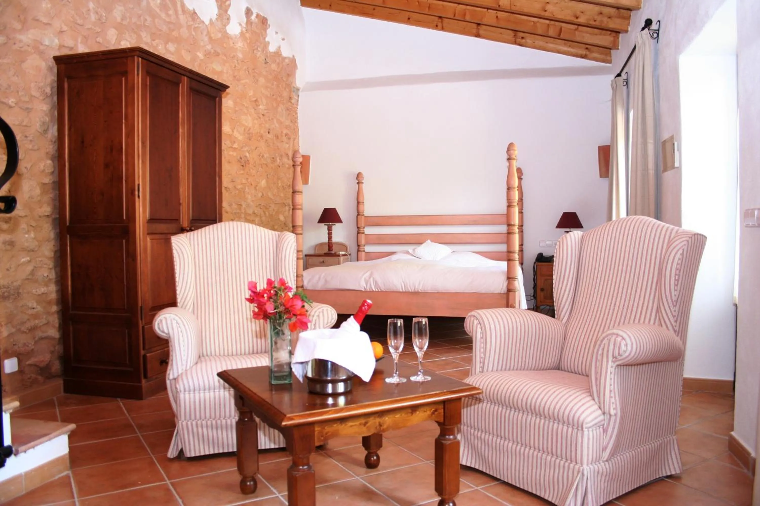 Living room, Bed in Boutique Hotel Sa Galera