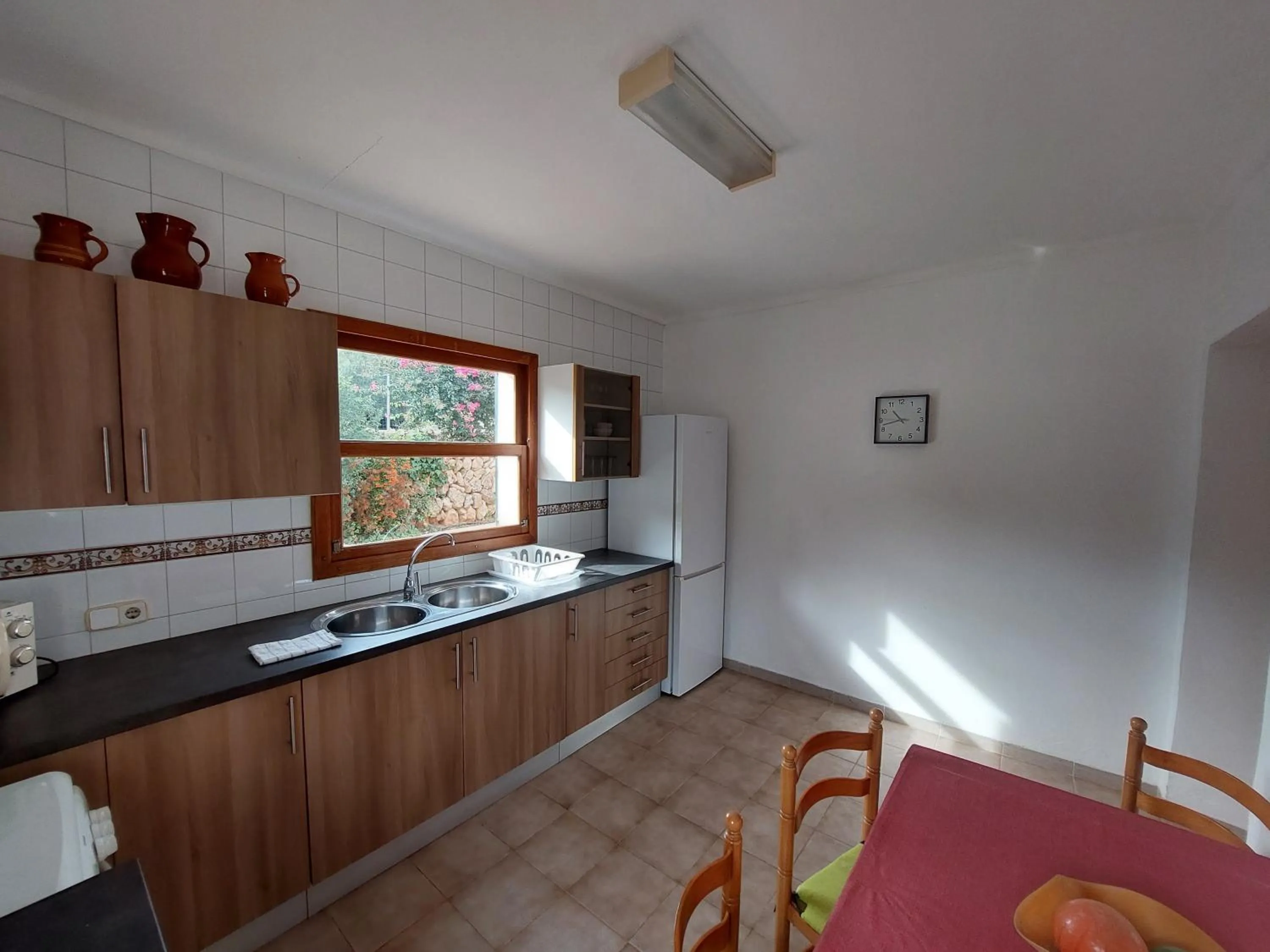 Kitchen or kitchenette in Boutique Hotel Sa Galera