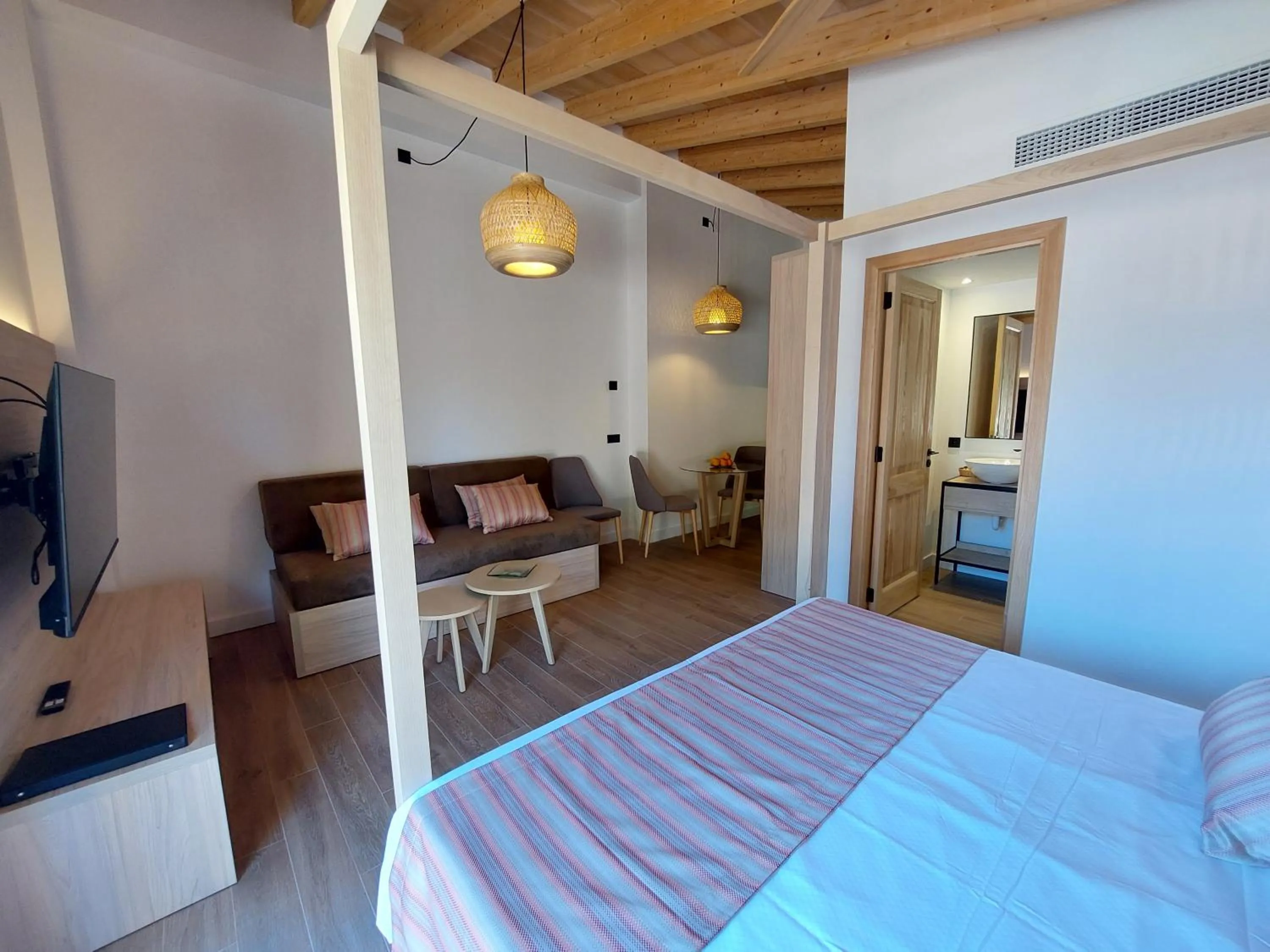 Seating area, Bed in Boutique Hotel Sa Galera