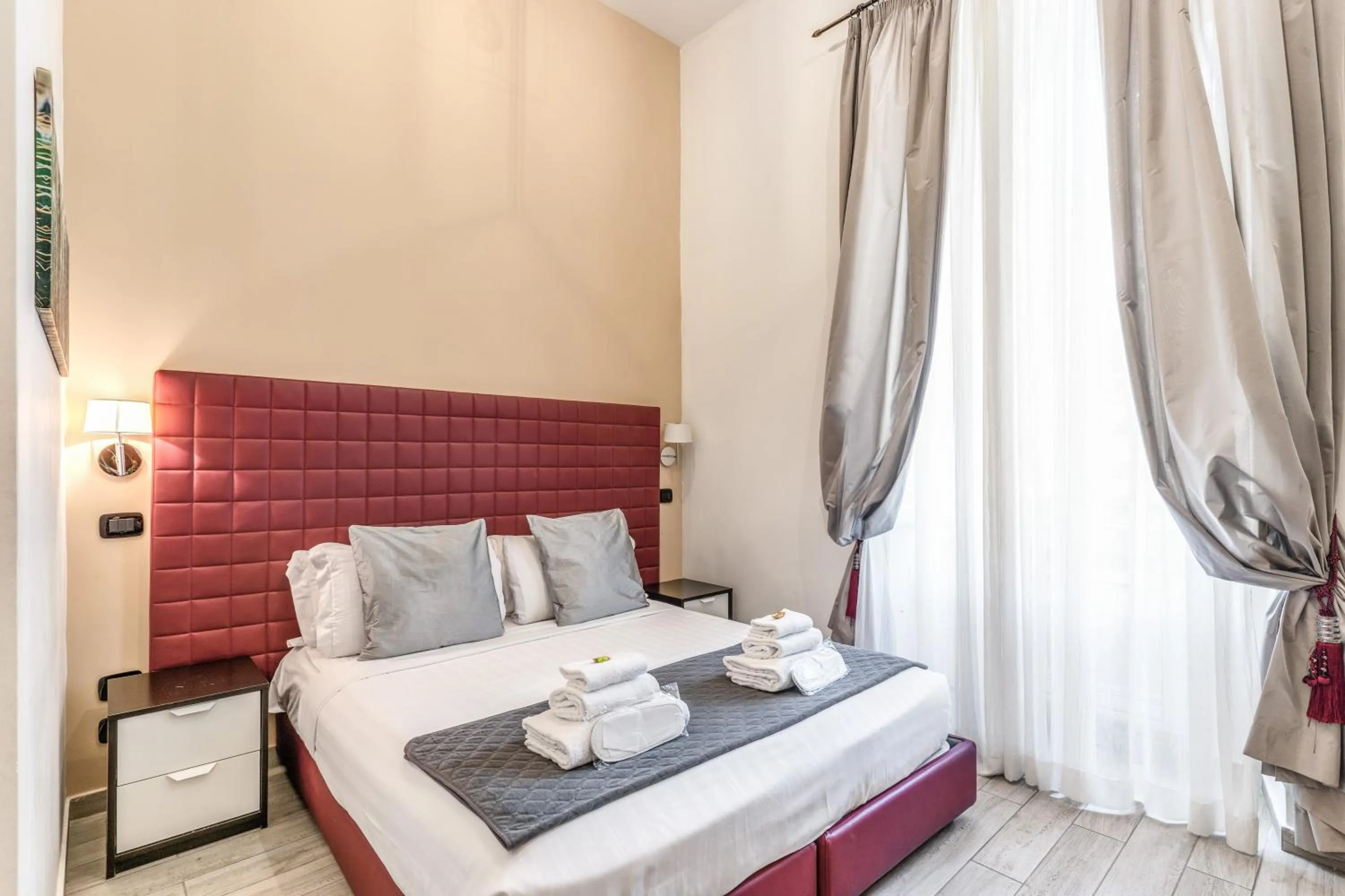 Bed in Operà Suites Pinciana