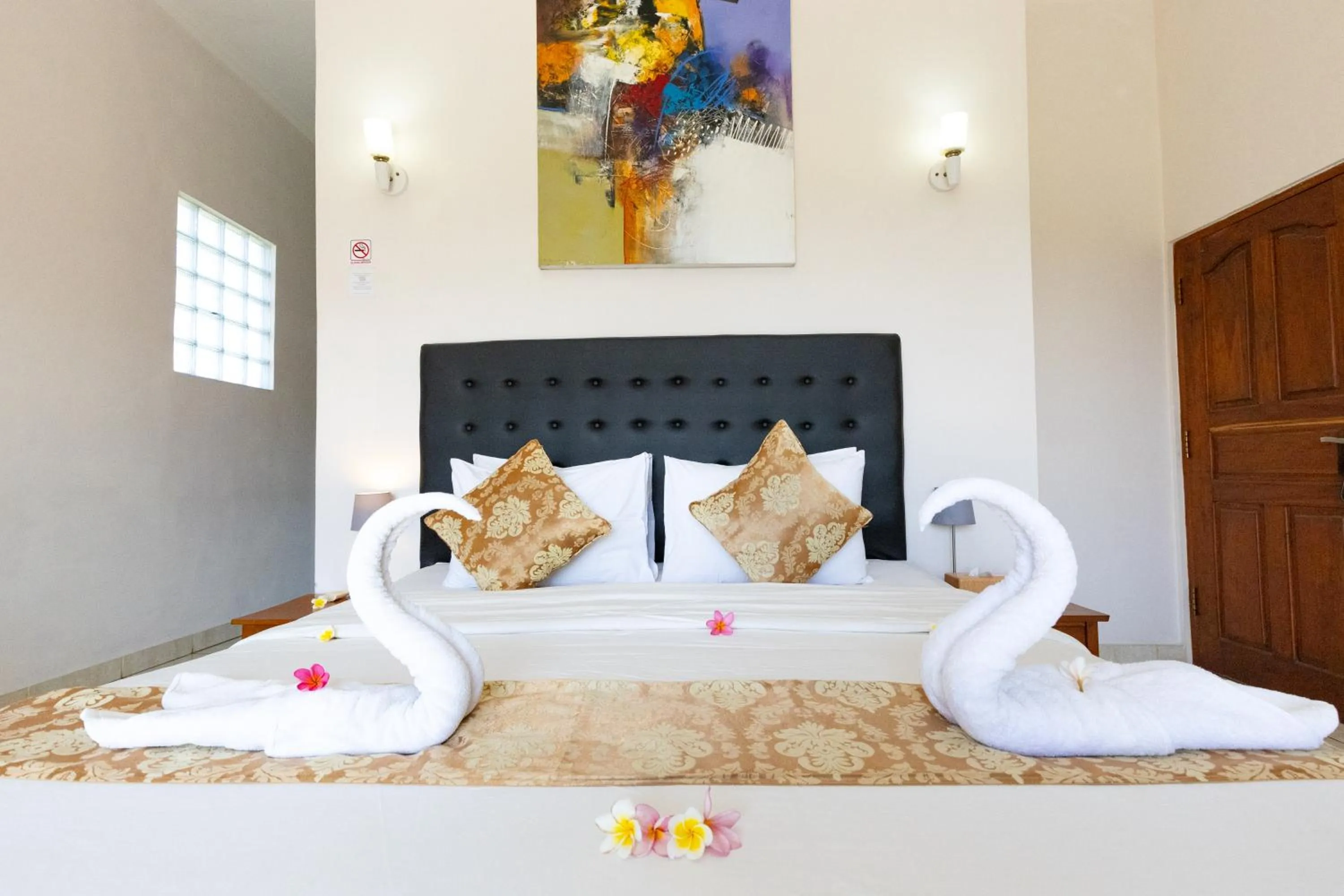 Bed in Ocean Villa Dive Resort - Tulamben