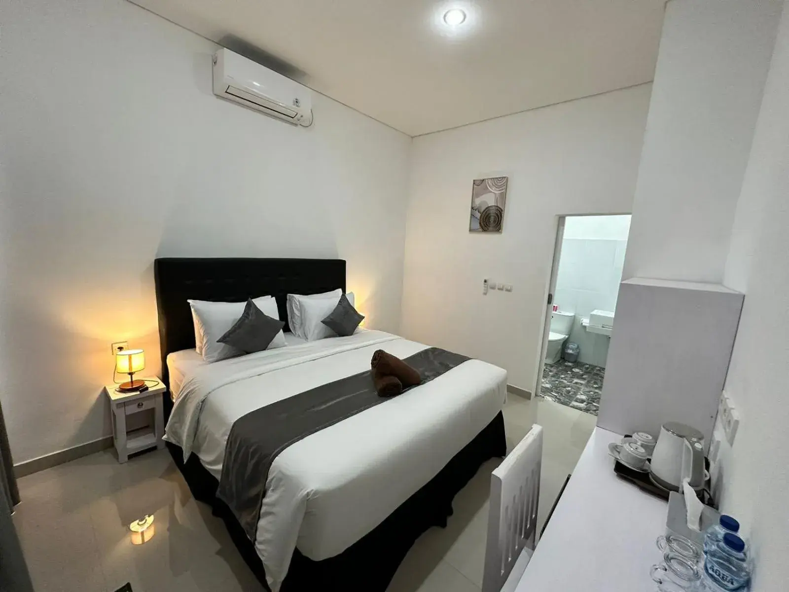 Bed in Ocean Villa Dive Resort - Tulamben Bed in Ocean Villa Dive Resort - Tulamben