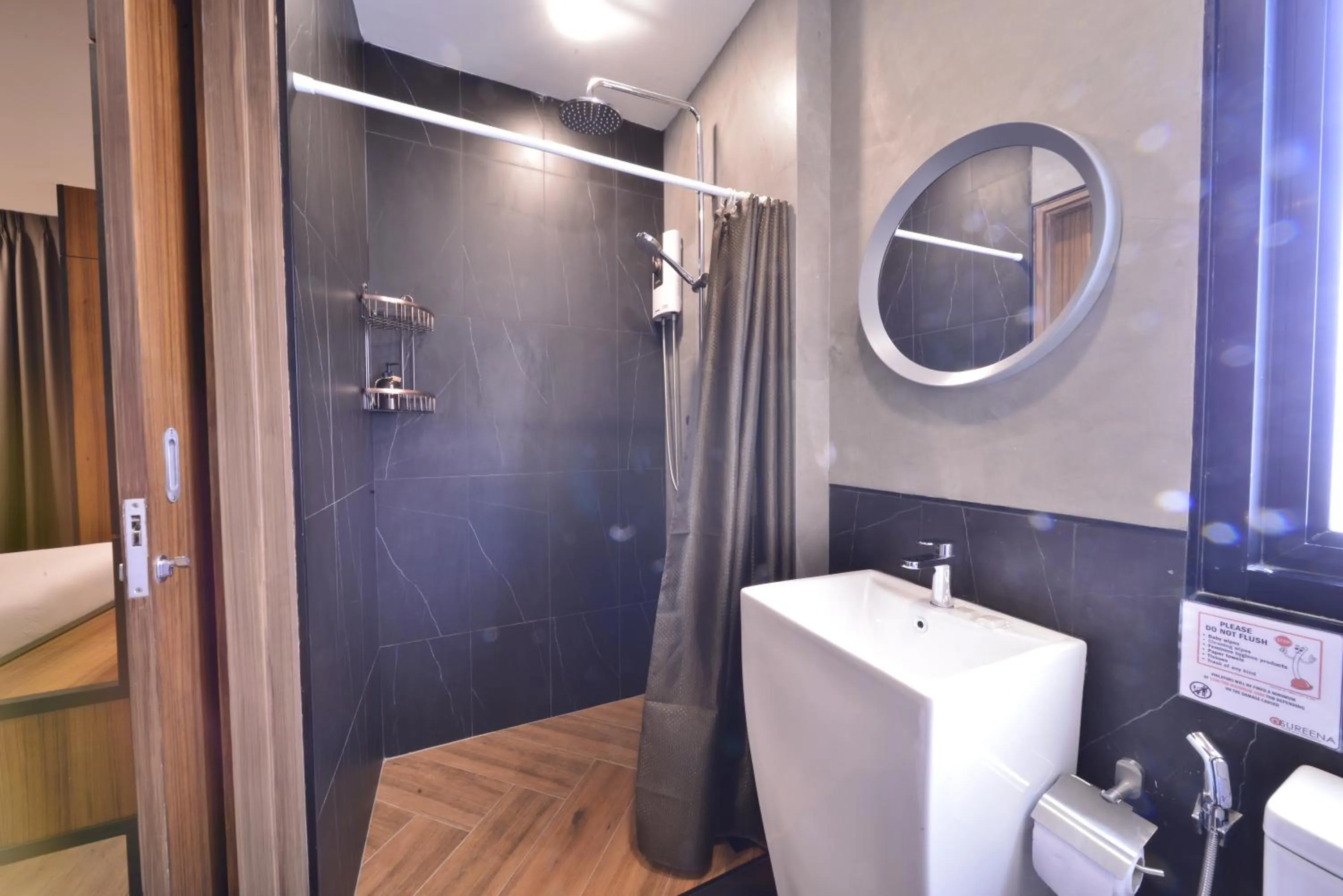 Bathroom in Sureena Hotel