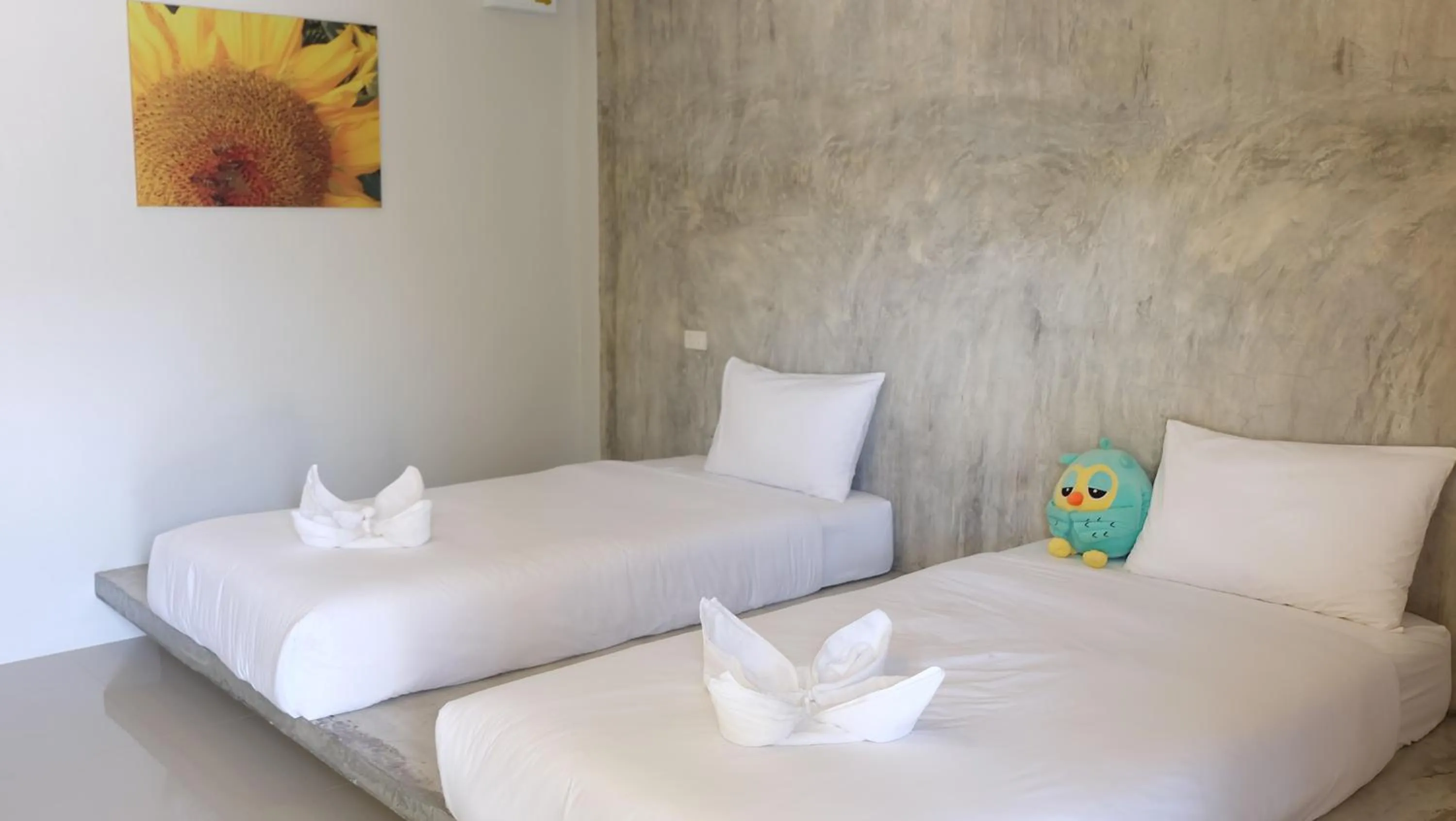 Bed in Lullaby Boutique Resort