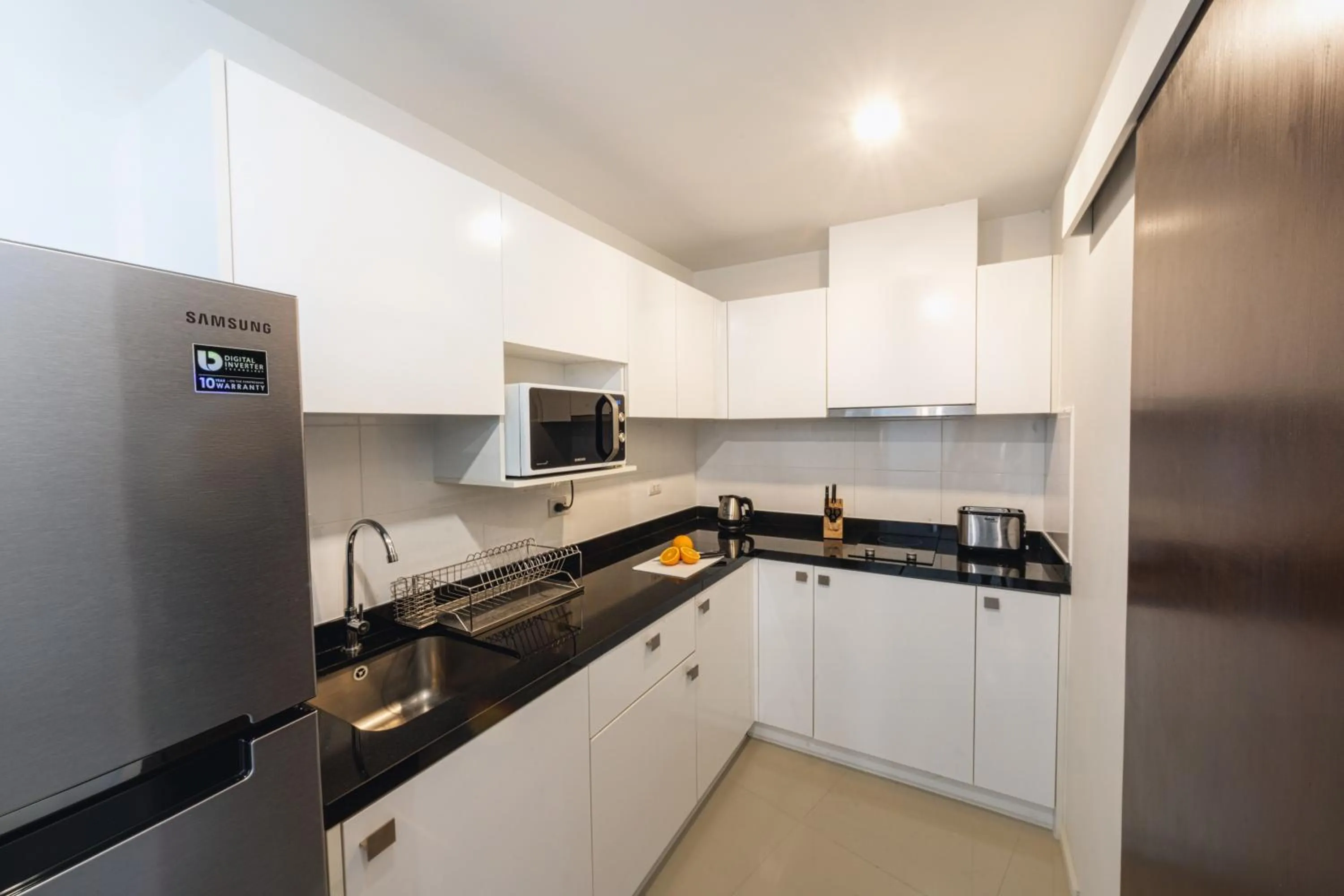 Kitchen or kitchenette in First Choice Grand Suites Sha Plus Extra