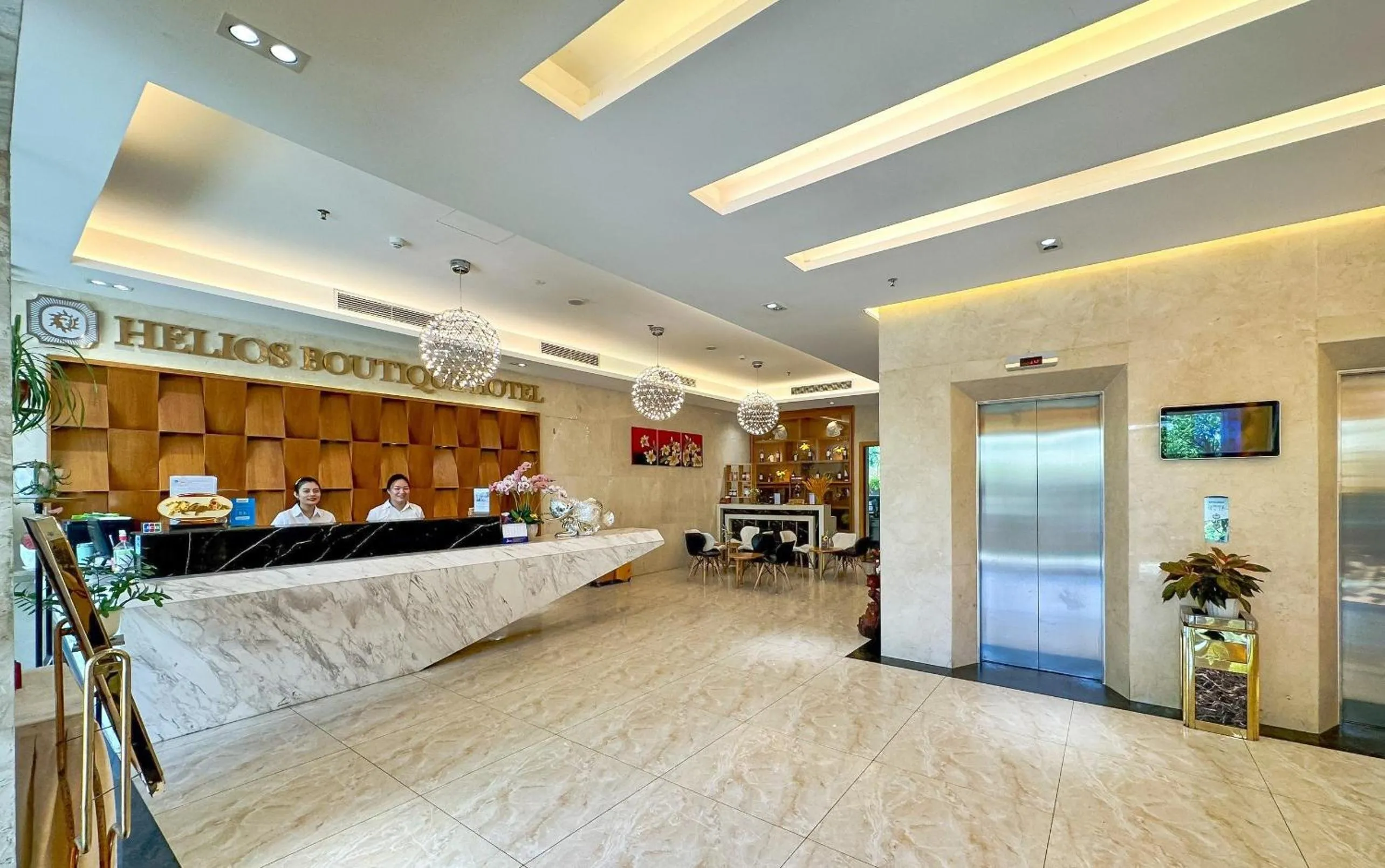 Communal lounge/ TV room in Helios Boutique Hotel & Spa