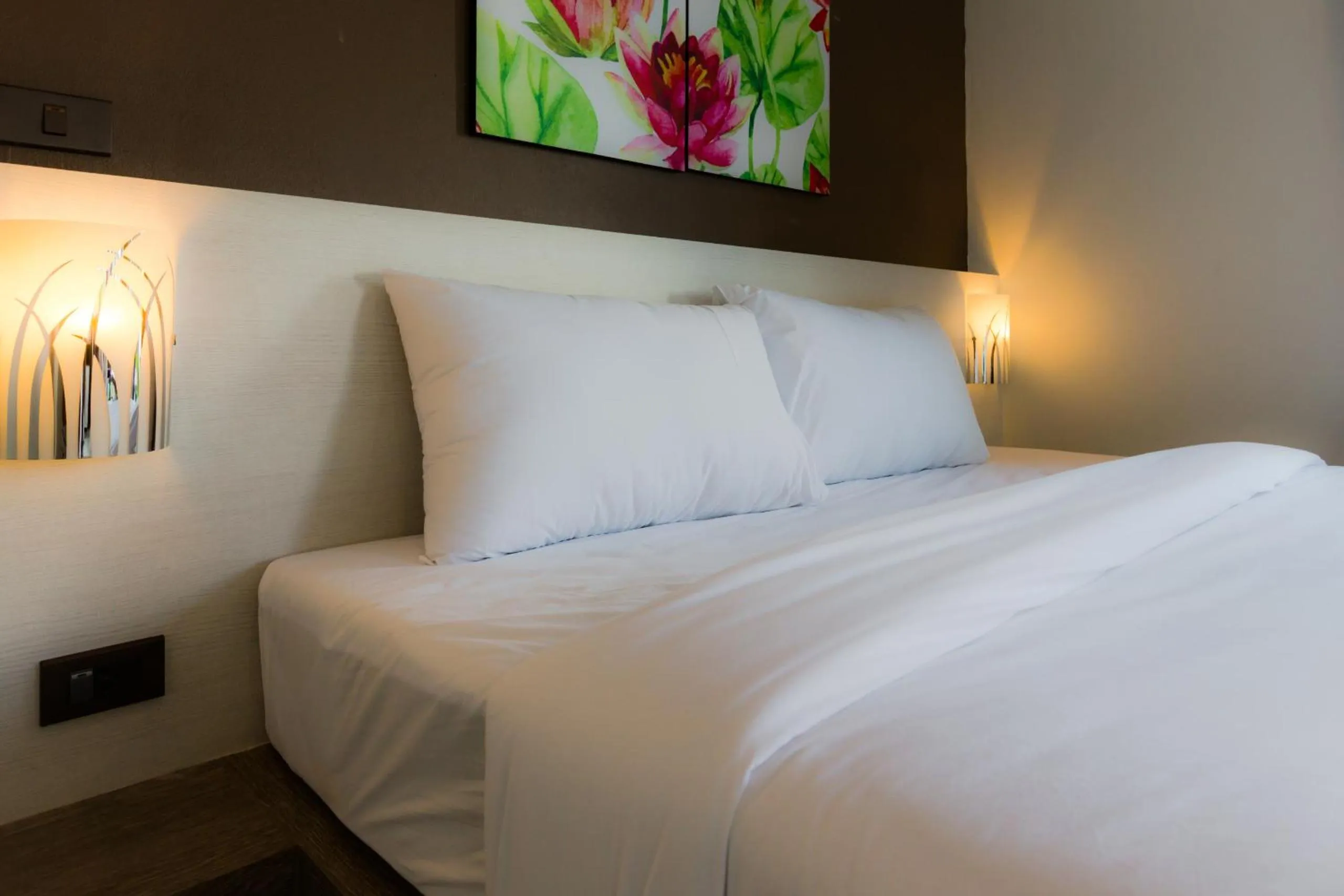 Bed in Bua Tara Resort