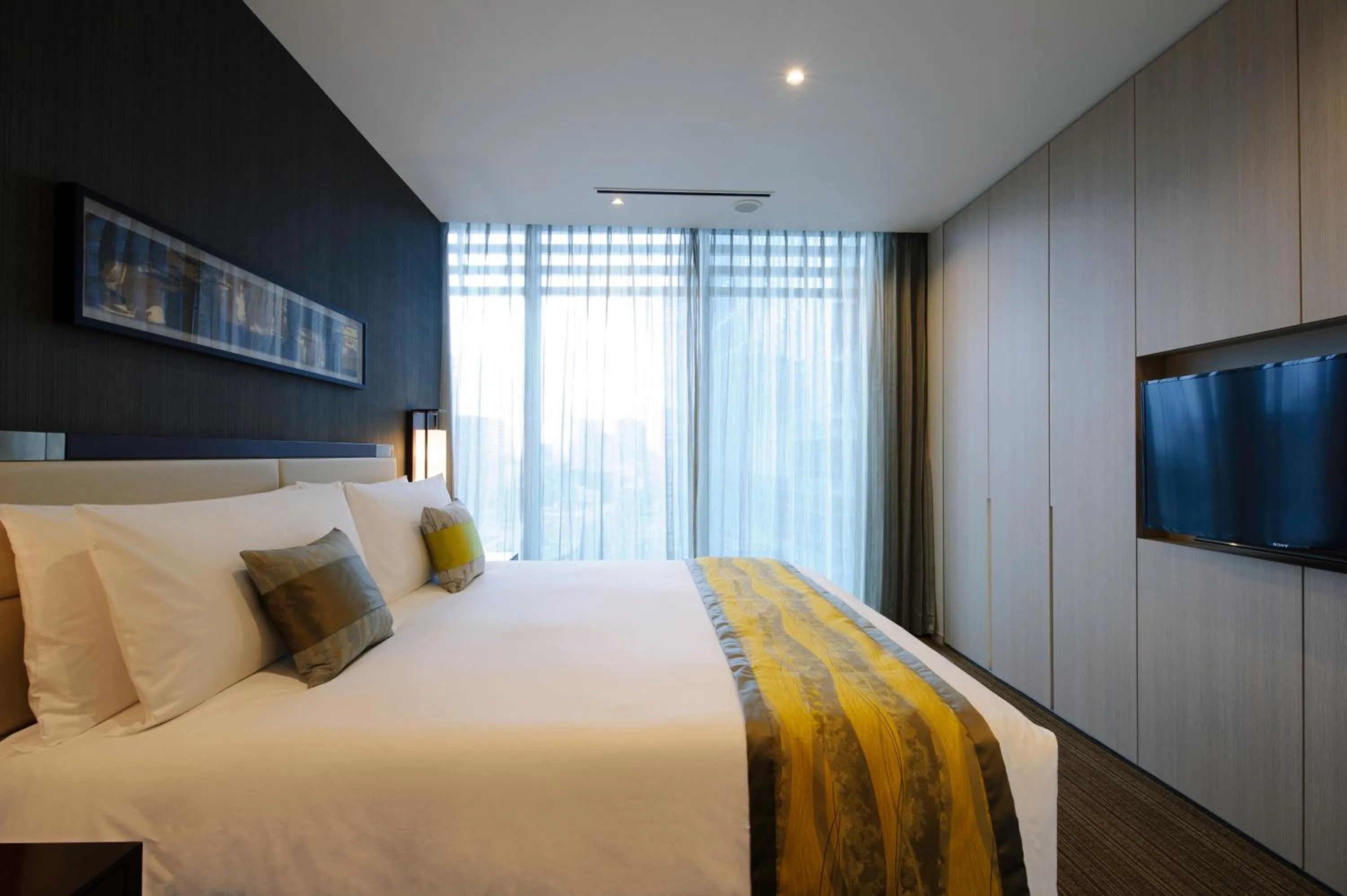 Bed in Oakwood Premier Tokyo