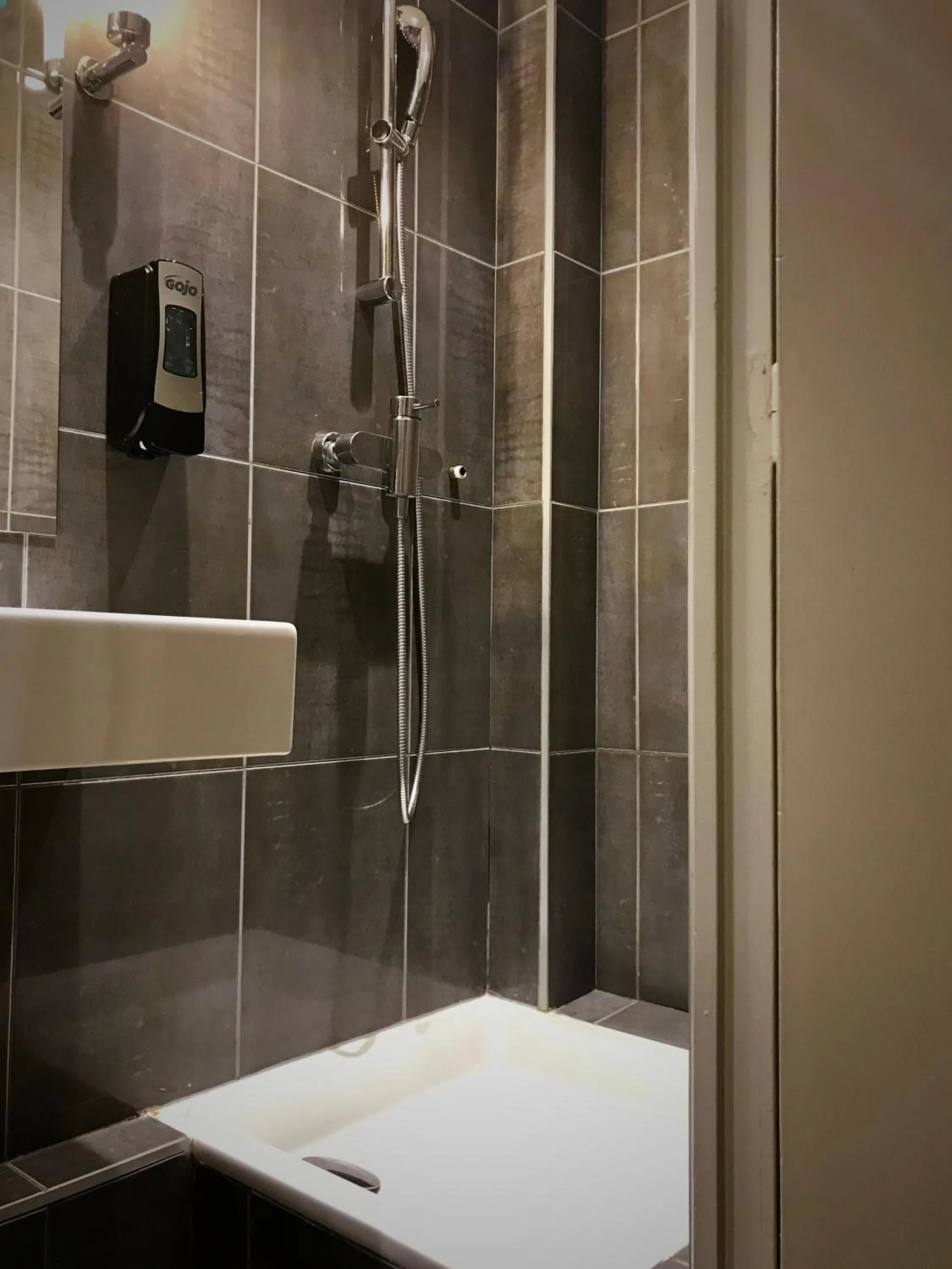 Shower in Plug inn Montmartre by Hiphophostels