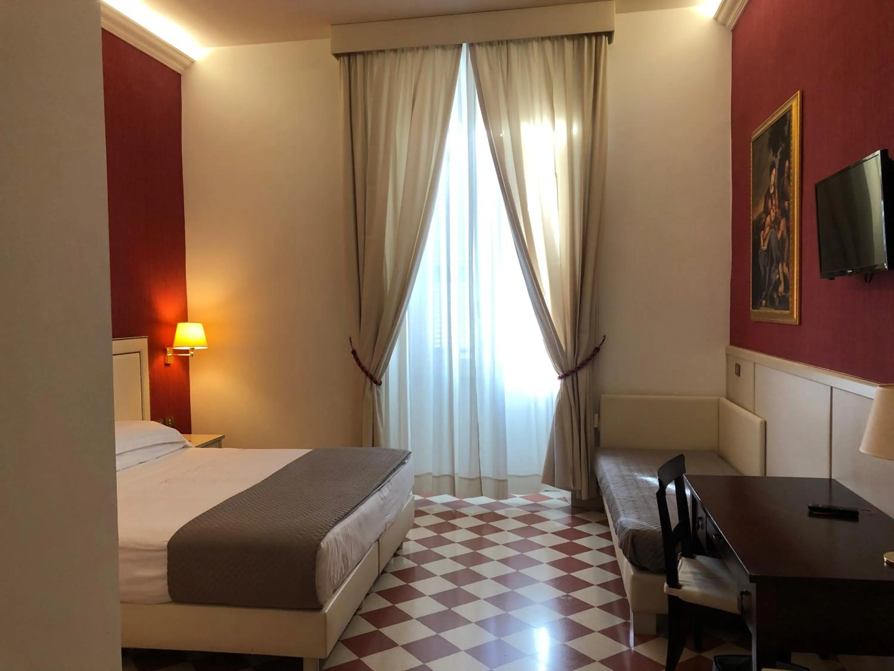 Bed in Basilica Hotel