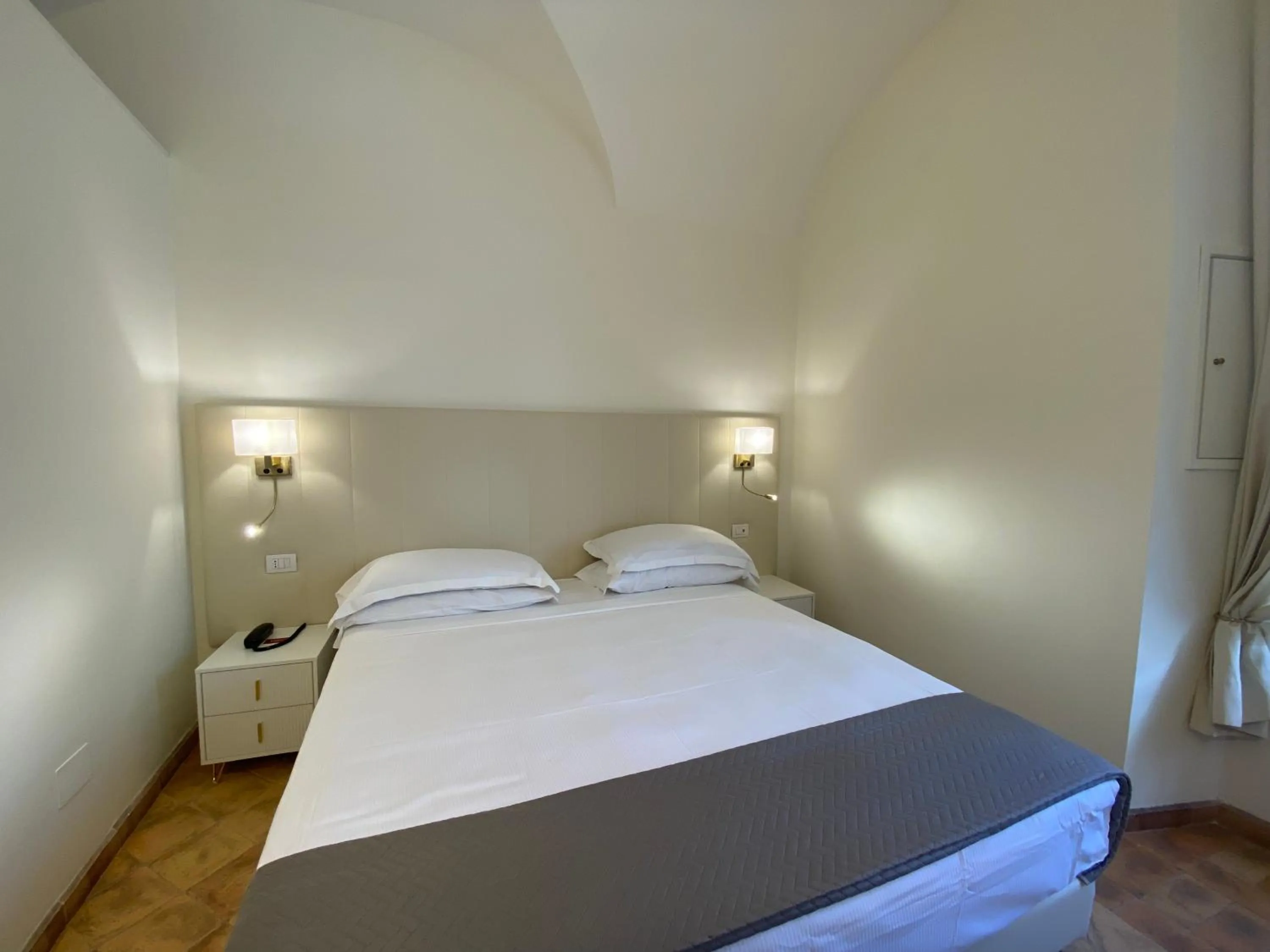 Bed in Basilica Hotel