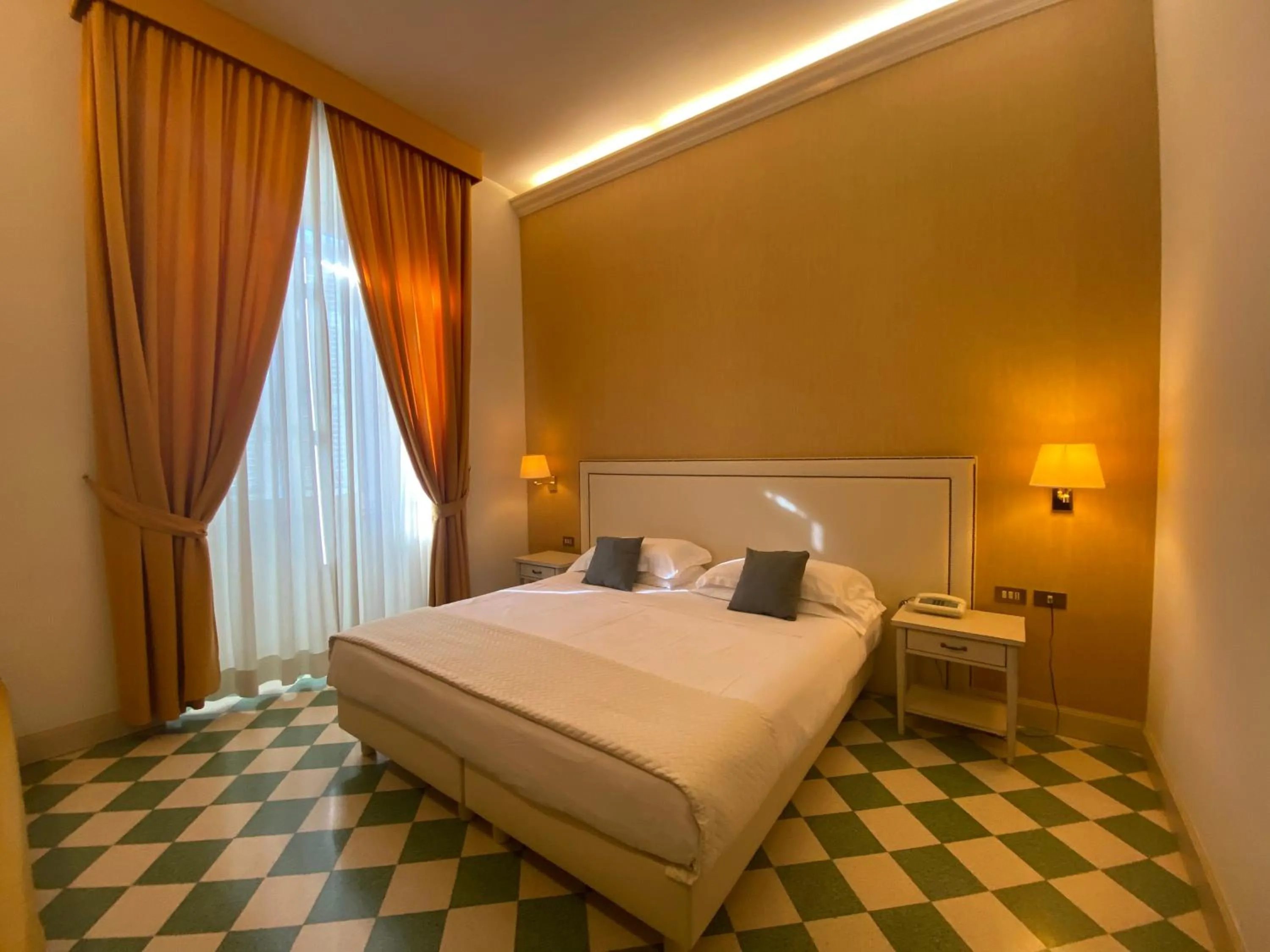 Bed in Basilica Hotel