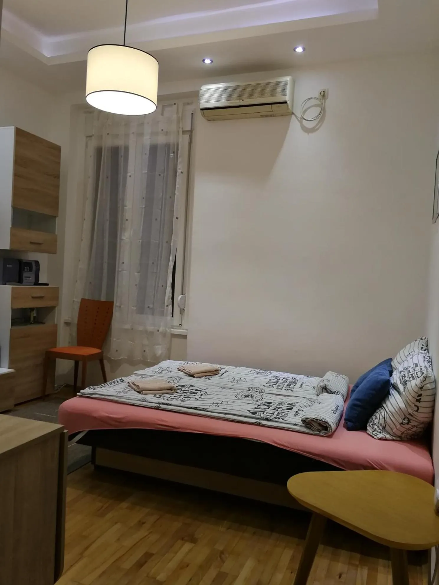 Bed in Imperia Apartments