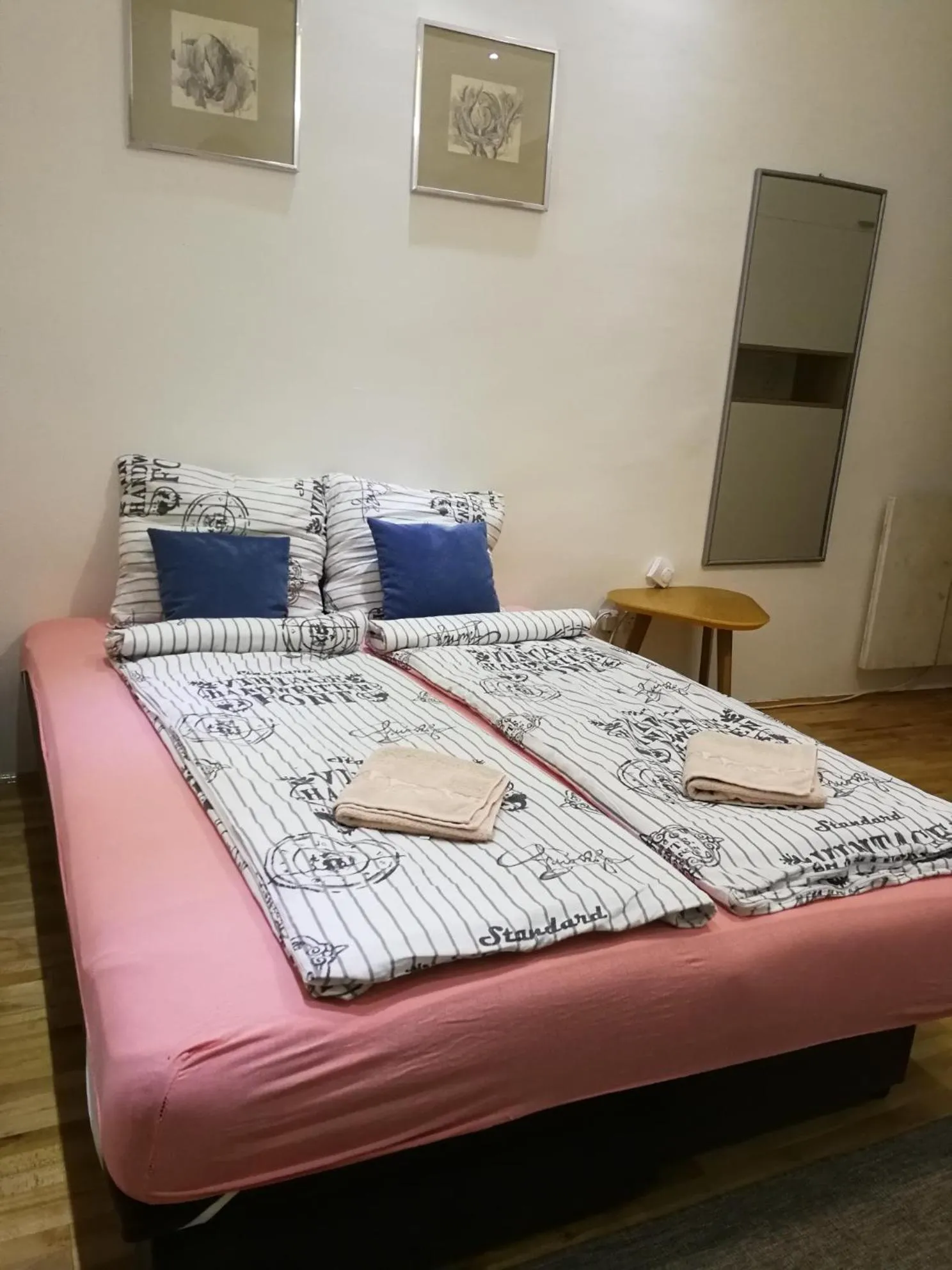 Bed in Imperia Apartments