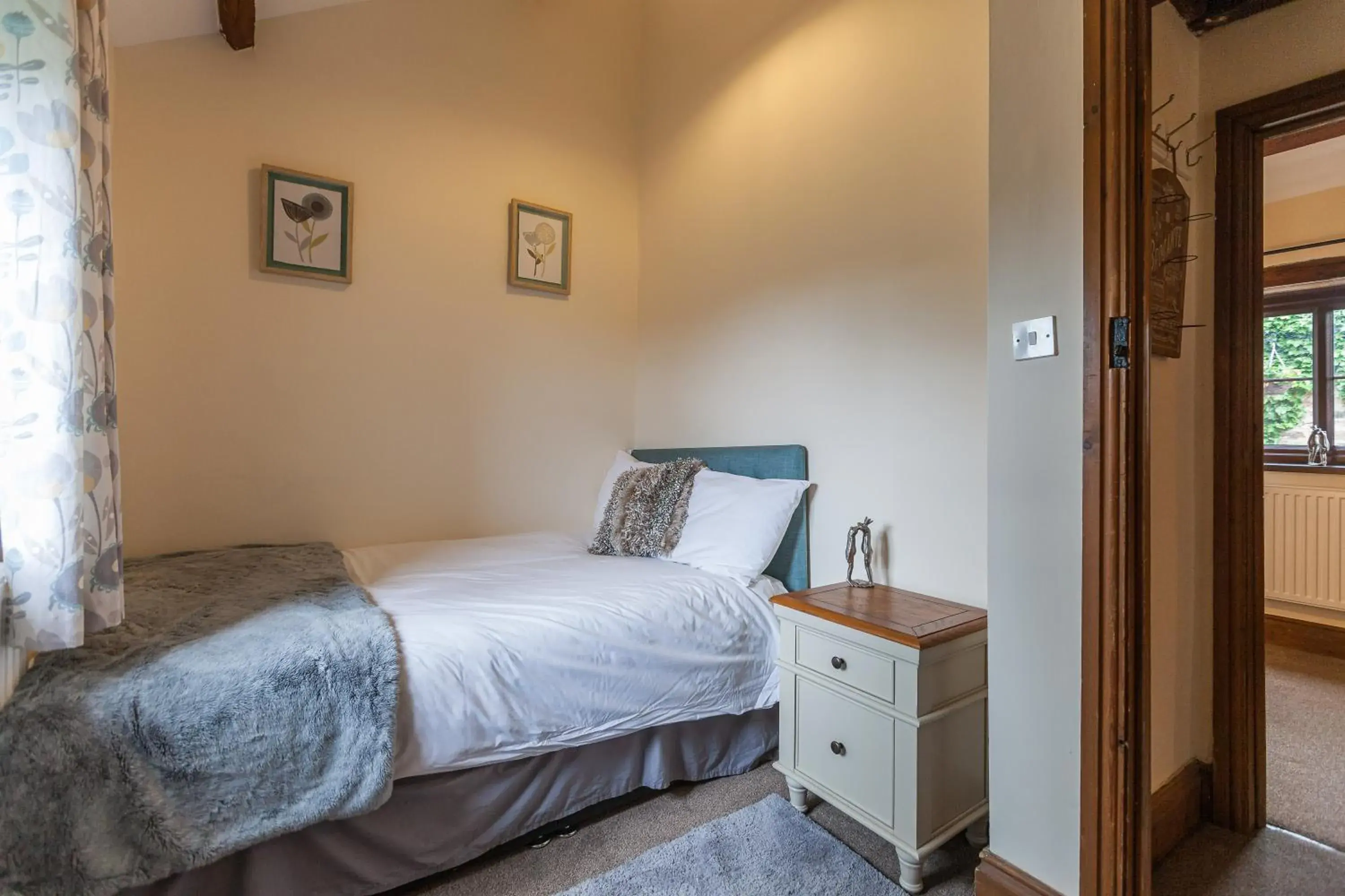 Decorative detail, Bed in Skipbridge Farm Cottages Decorative detail, Bed in Skipbridge Farm Cottages