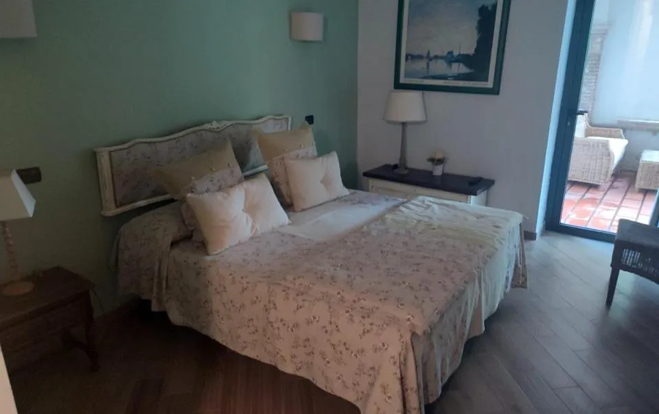 Bed in La Vignola Country Hotel