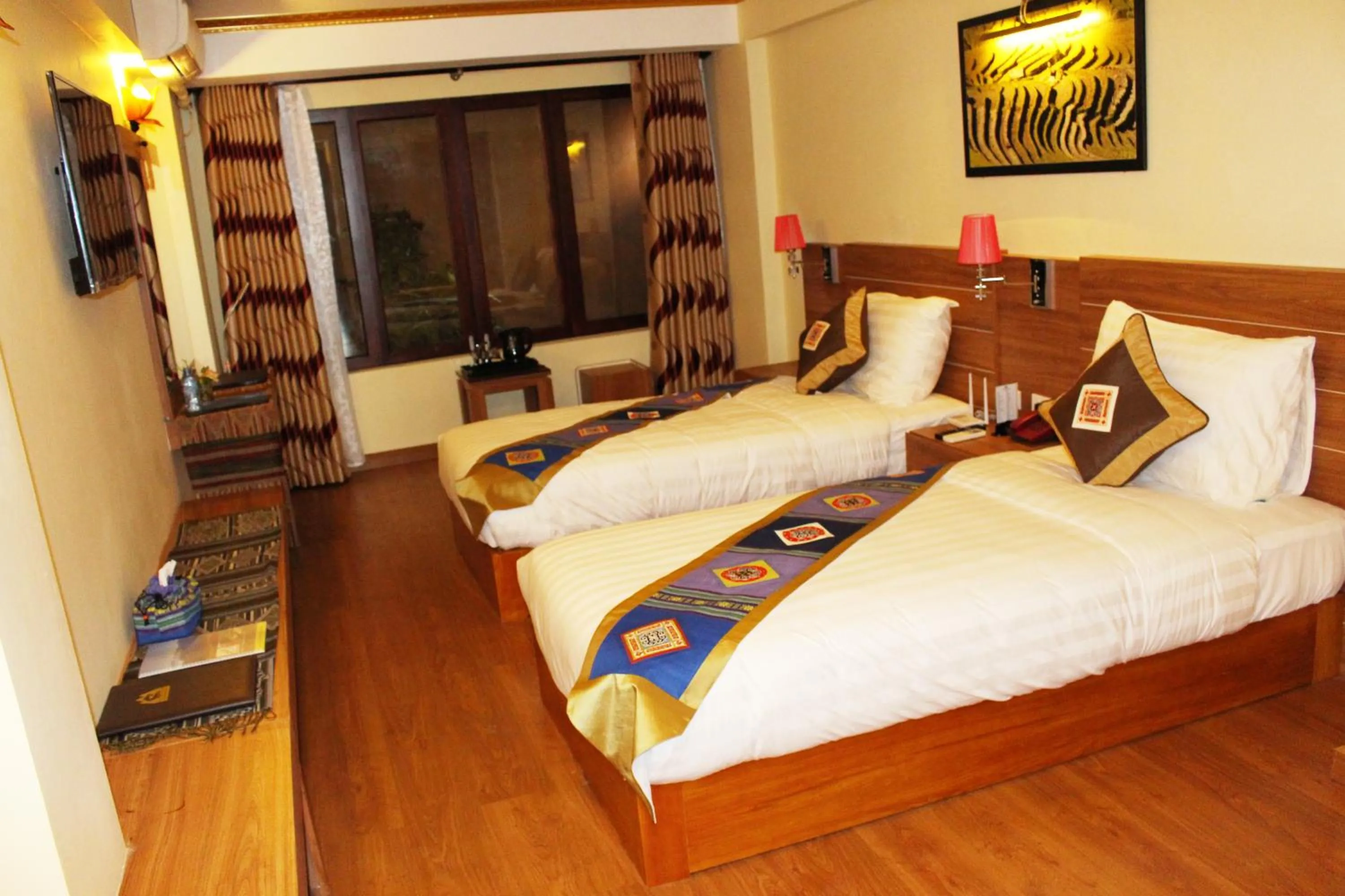 Photo of the whole room, Bed in Sapa Dragon Hotel
