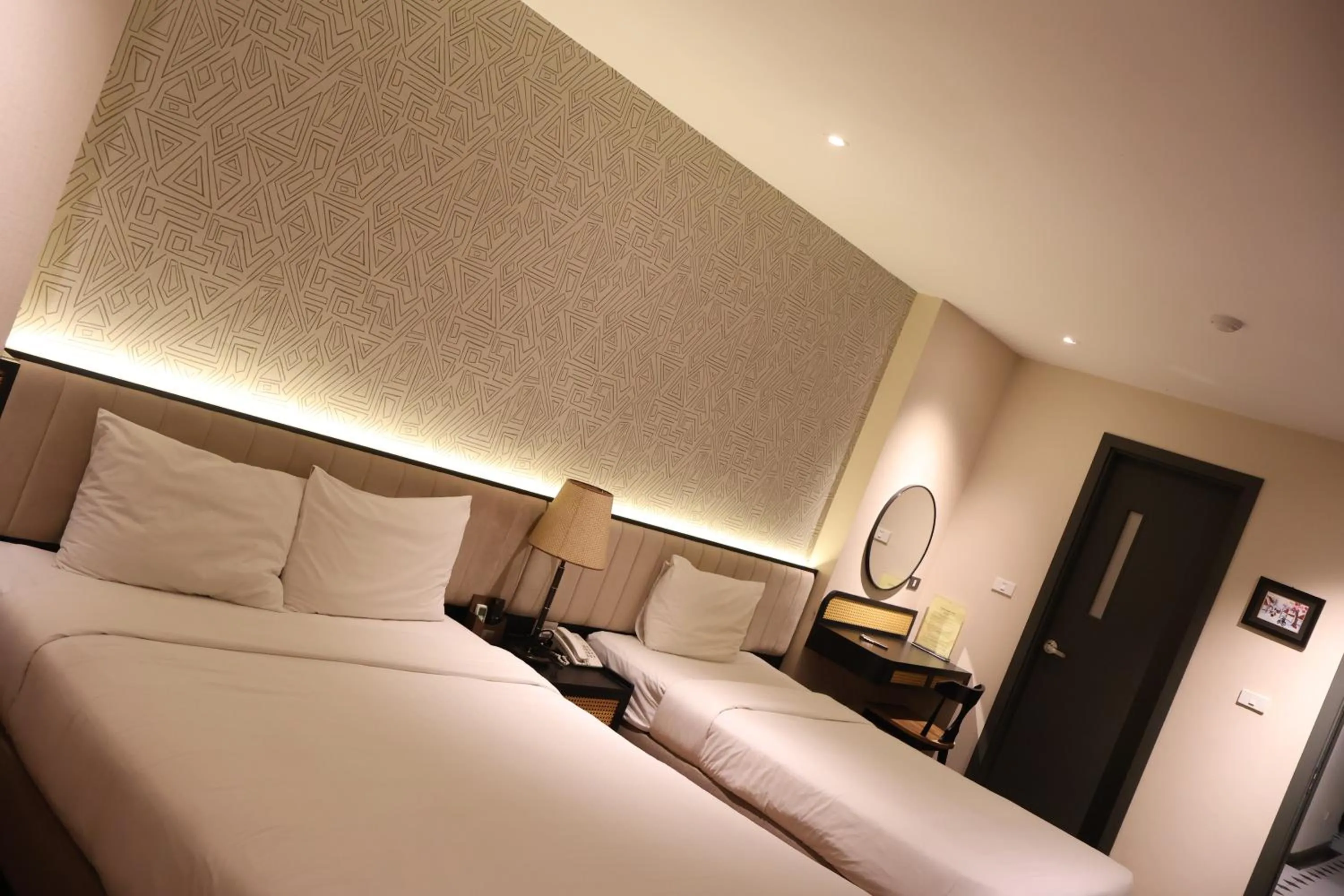 Bed in Canary Ha Noi Hotel