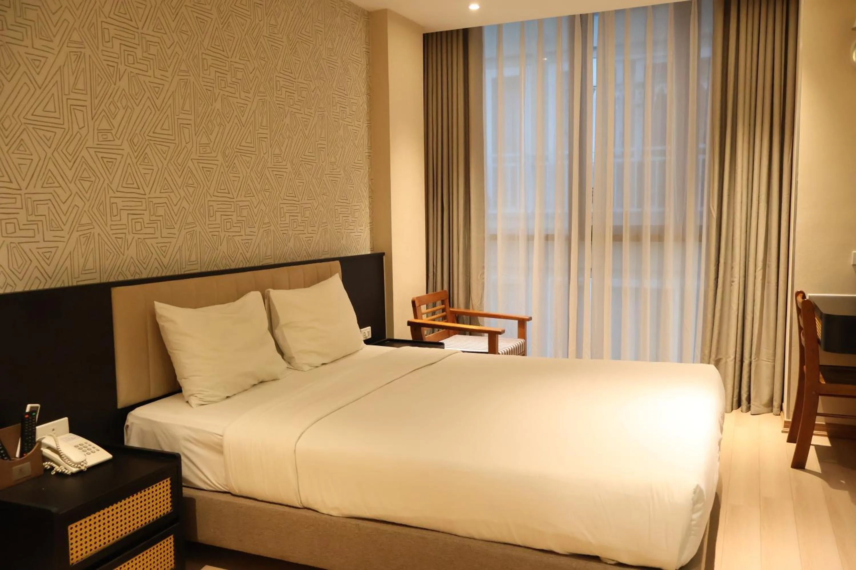 Bed in Canary Ha Noi Hotel