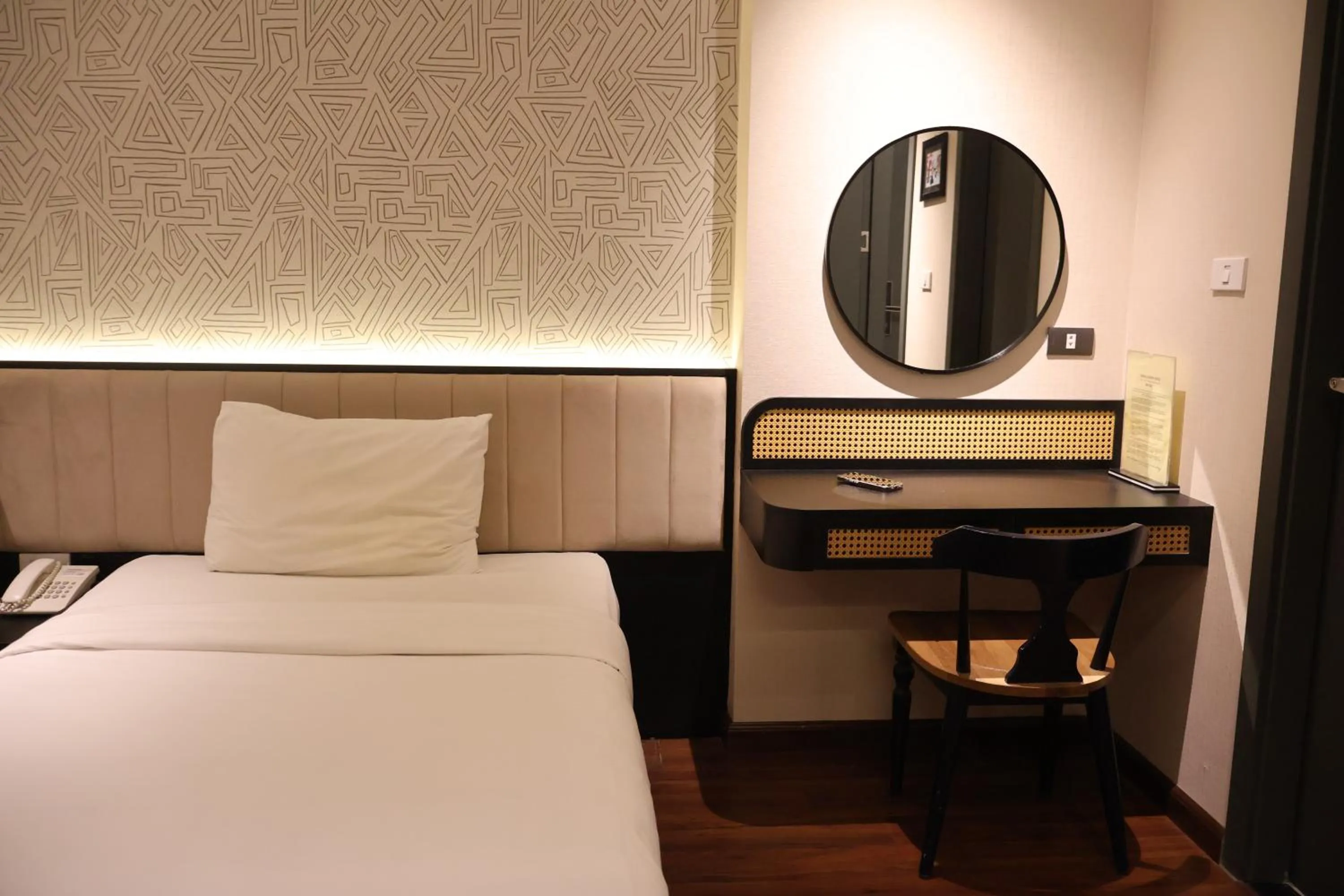 Bed in Canary Ha Noi Hotel