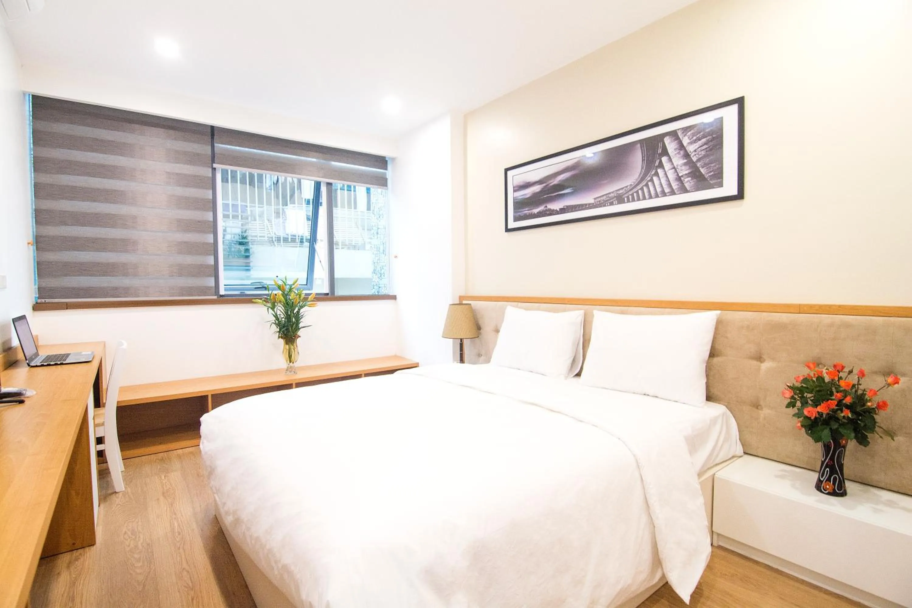 Bed in Canary Ha Noi Hotel