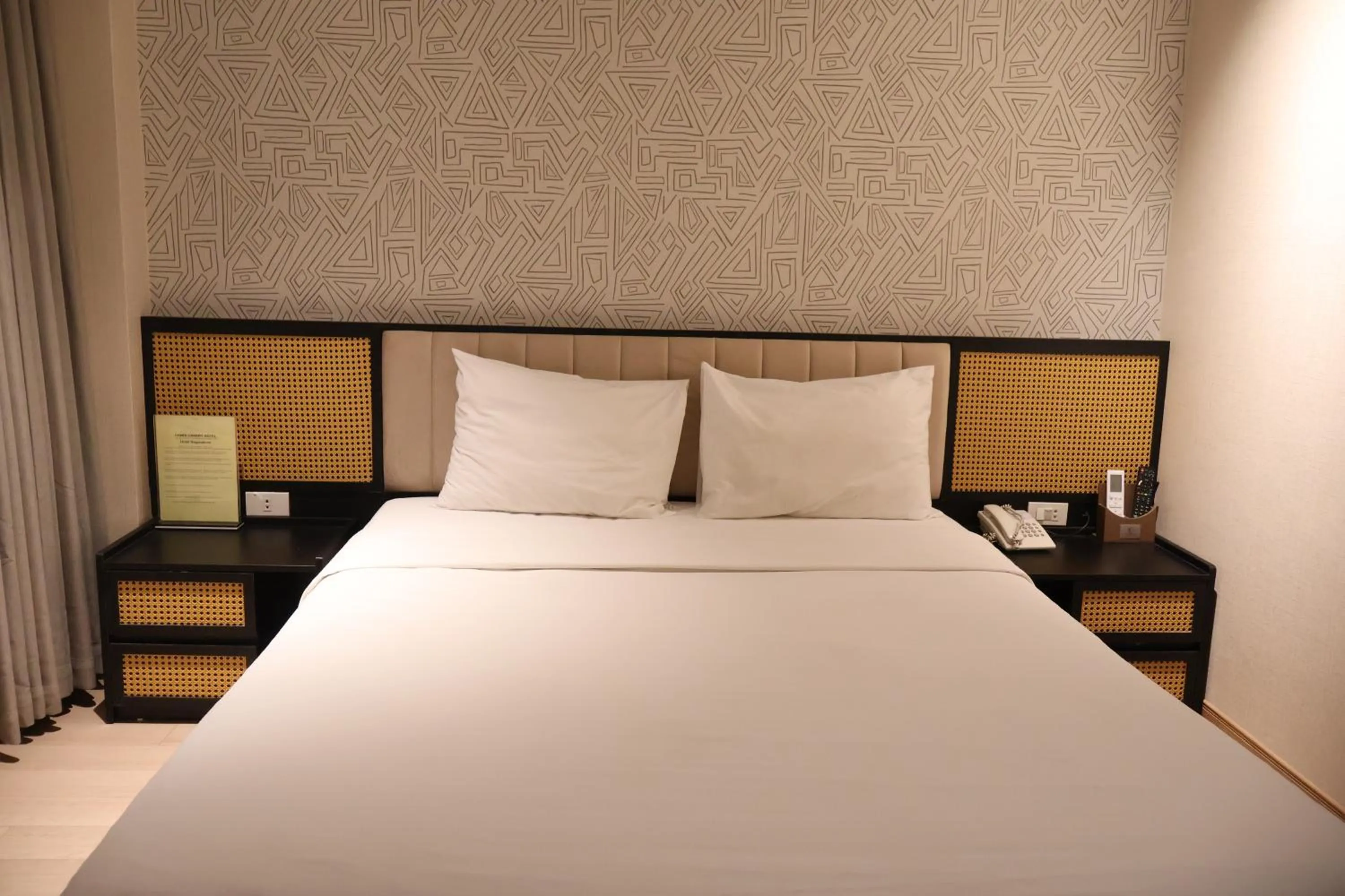 Bed in Canary Ha Noi Hotel