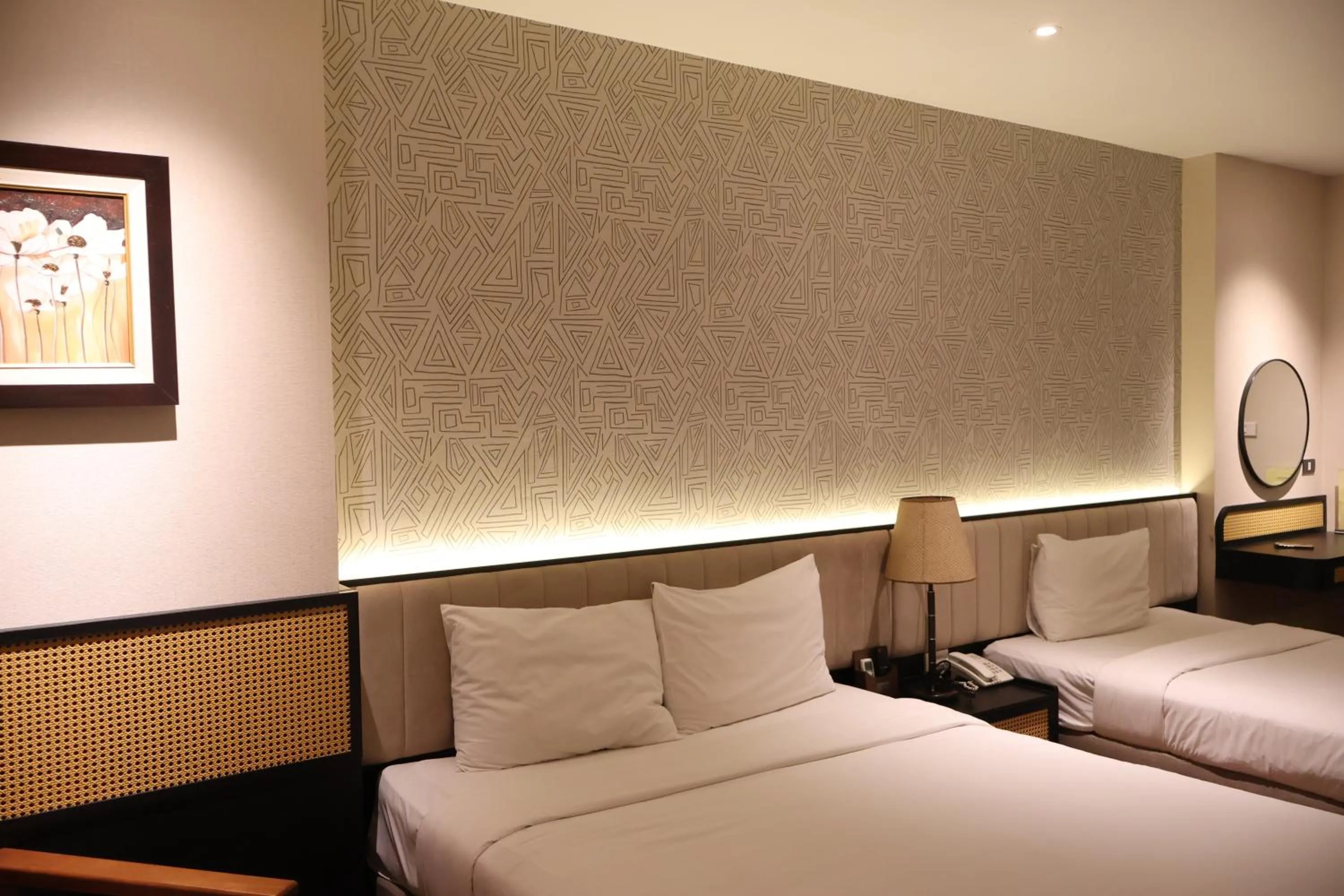 Bed in Canary Ha Noi Hotel