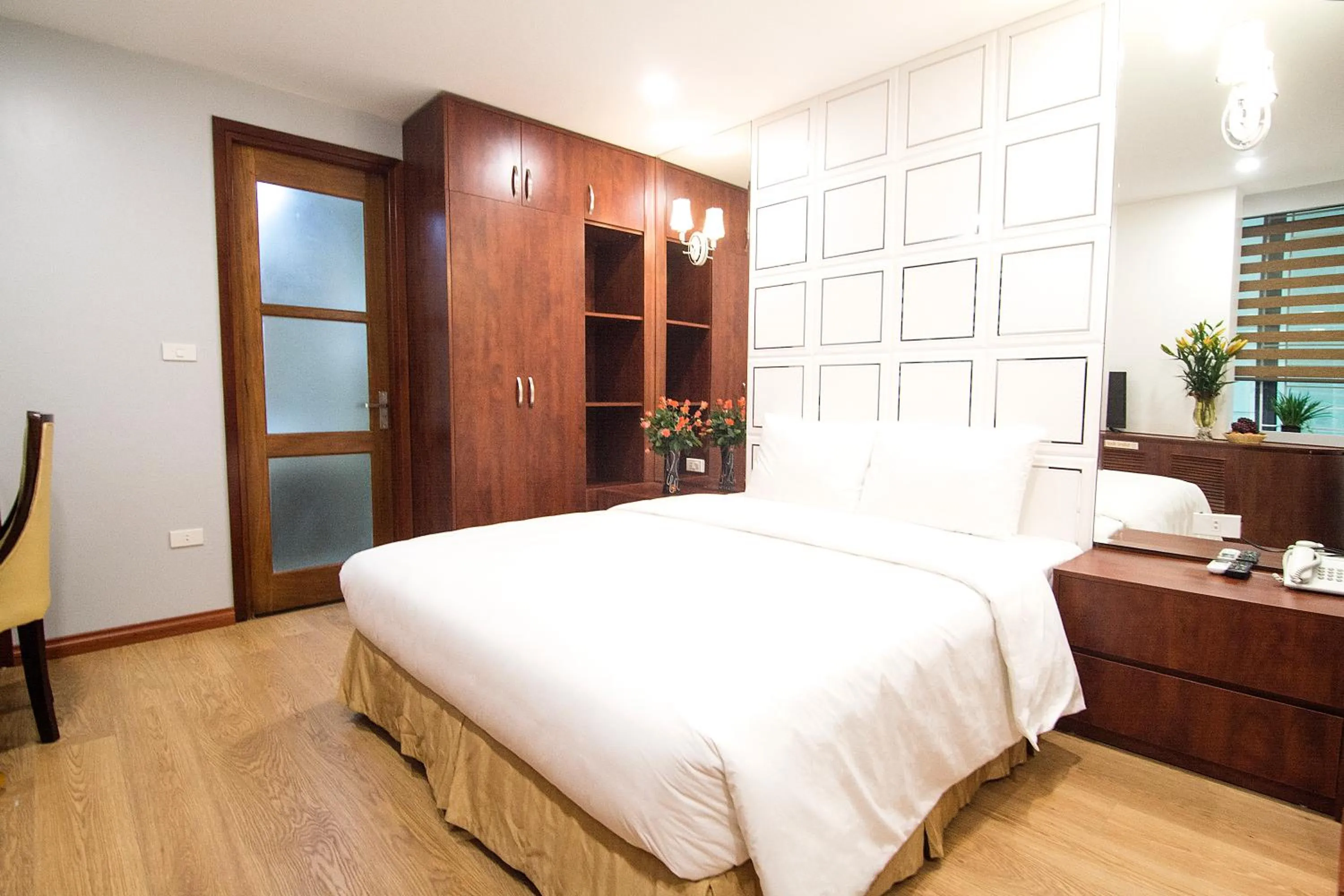 Bed in Canary Ha Noi Hotel