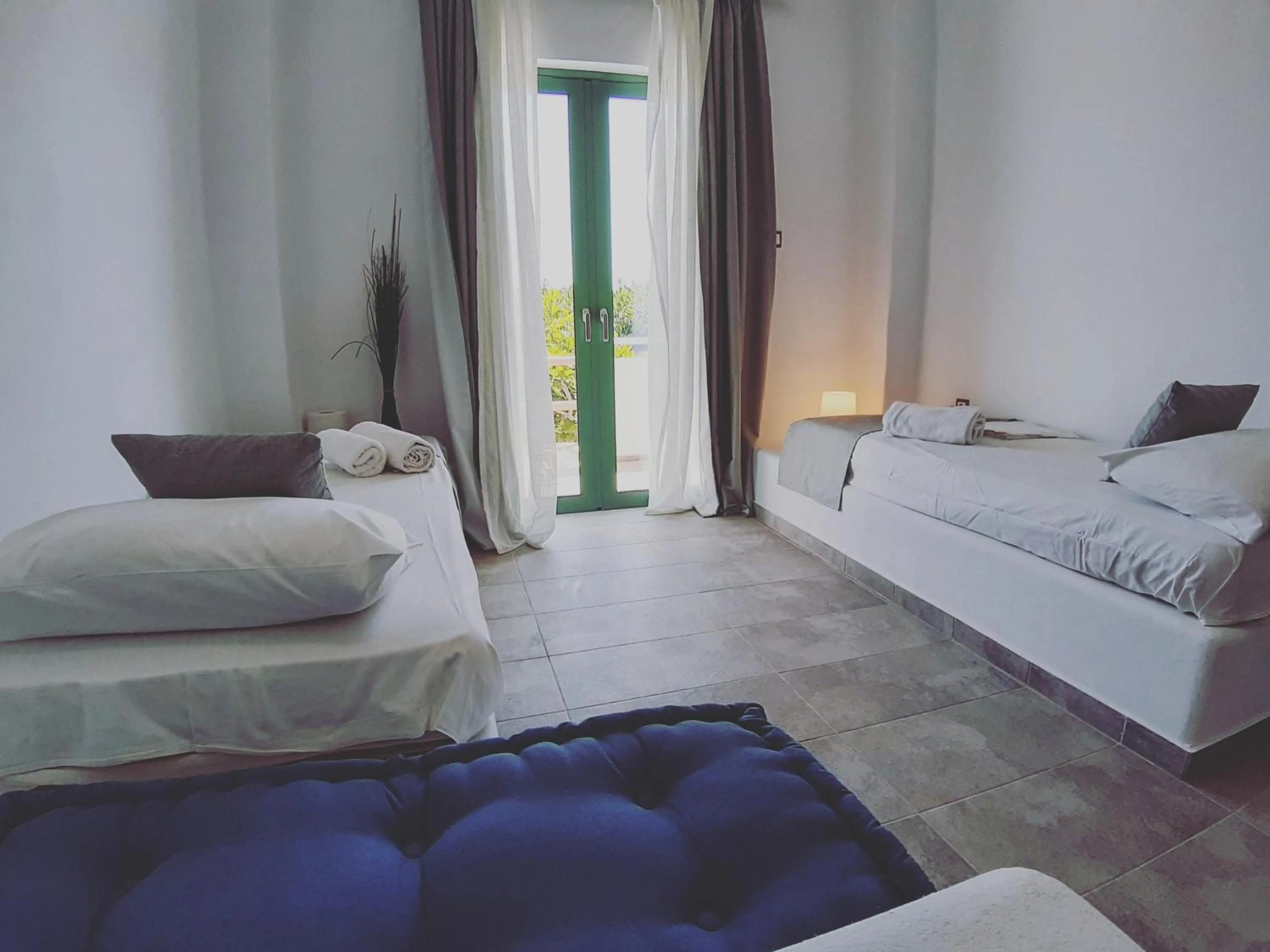 Seating area, Bed in Filio Guesthouse