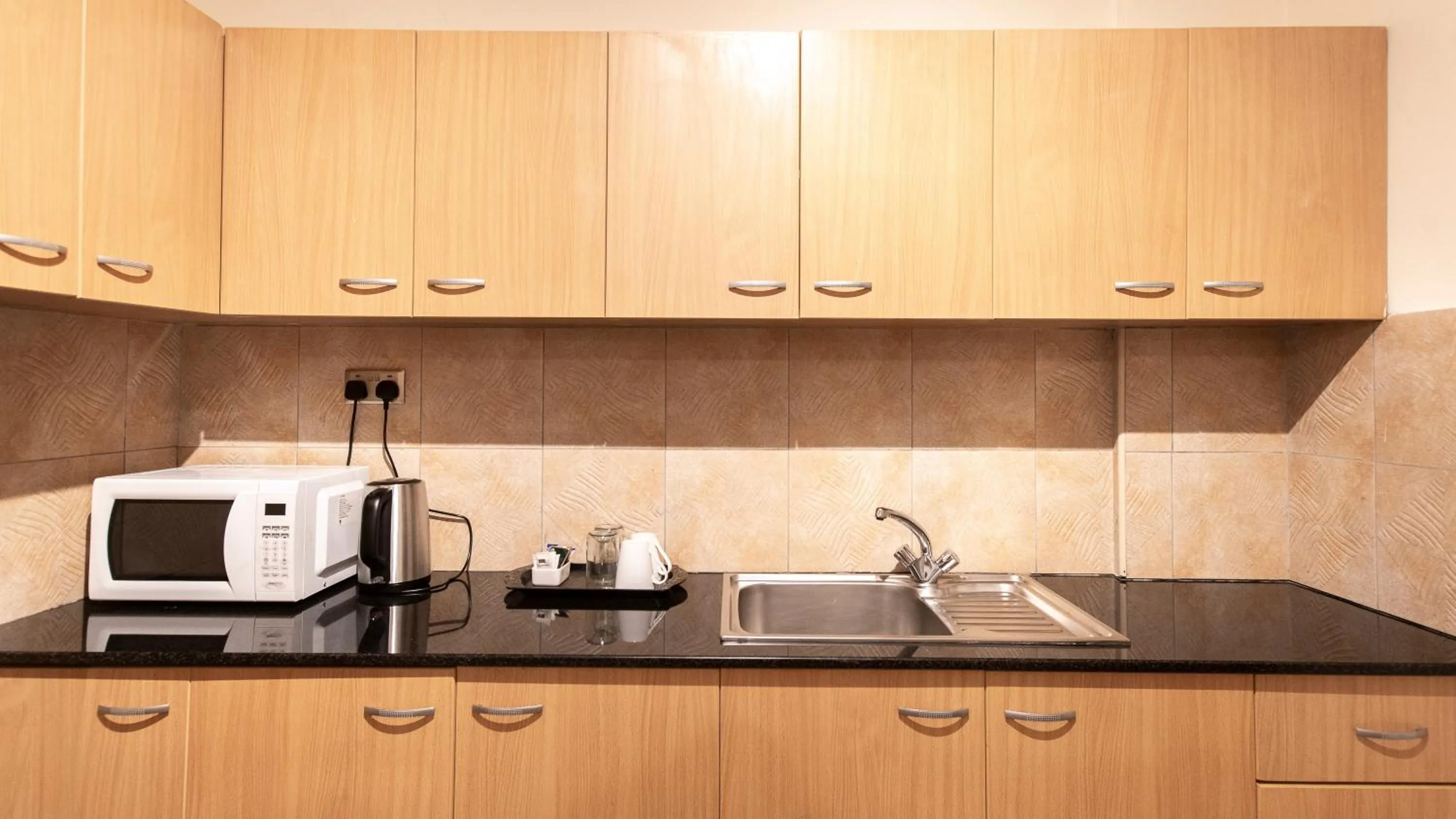 Coffee/tea facilities in Lotos Inn & Suites, Nairobi