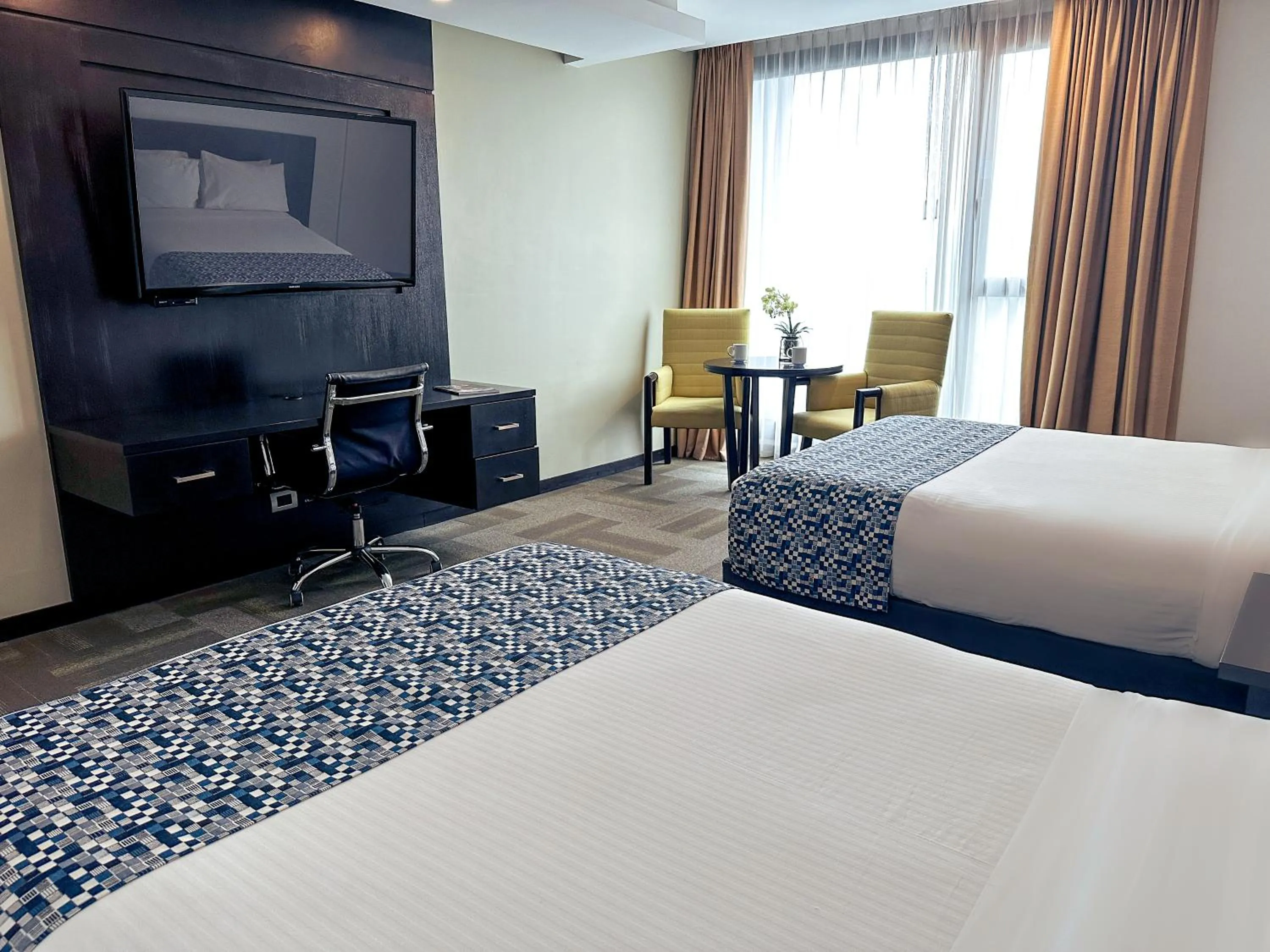 Bed in Wyndham Quito Airport