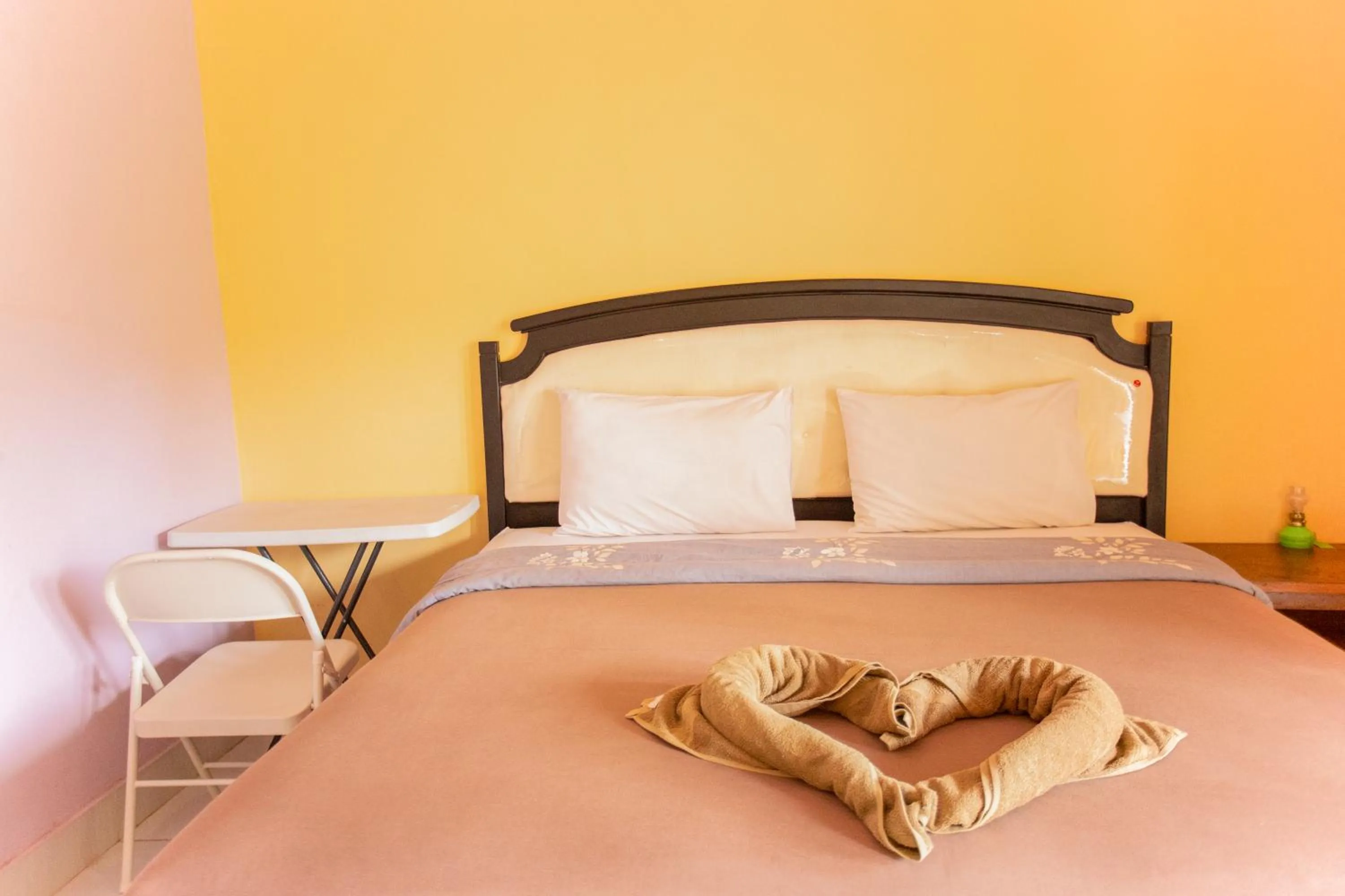 Bed in Pondok Guru Bakti Cottage