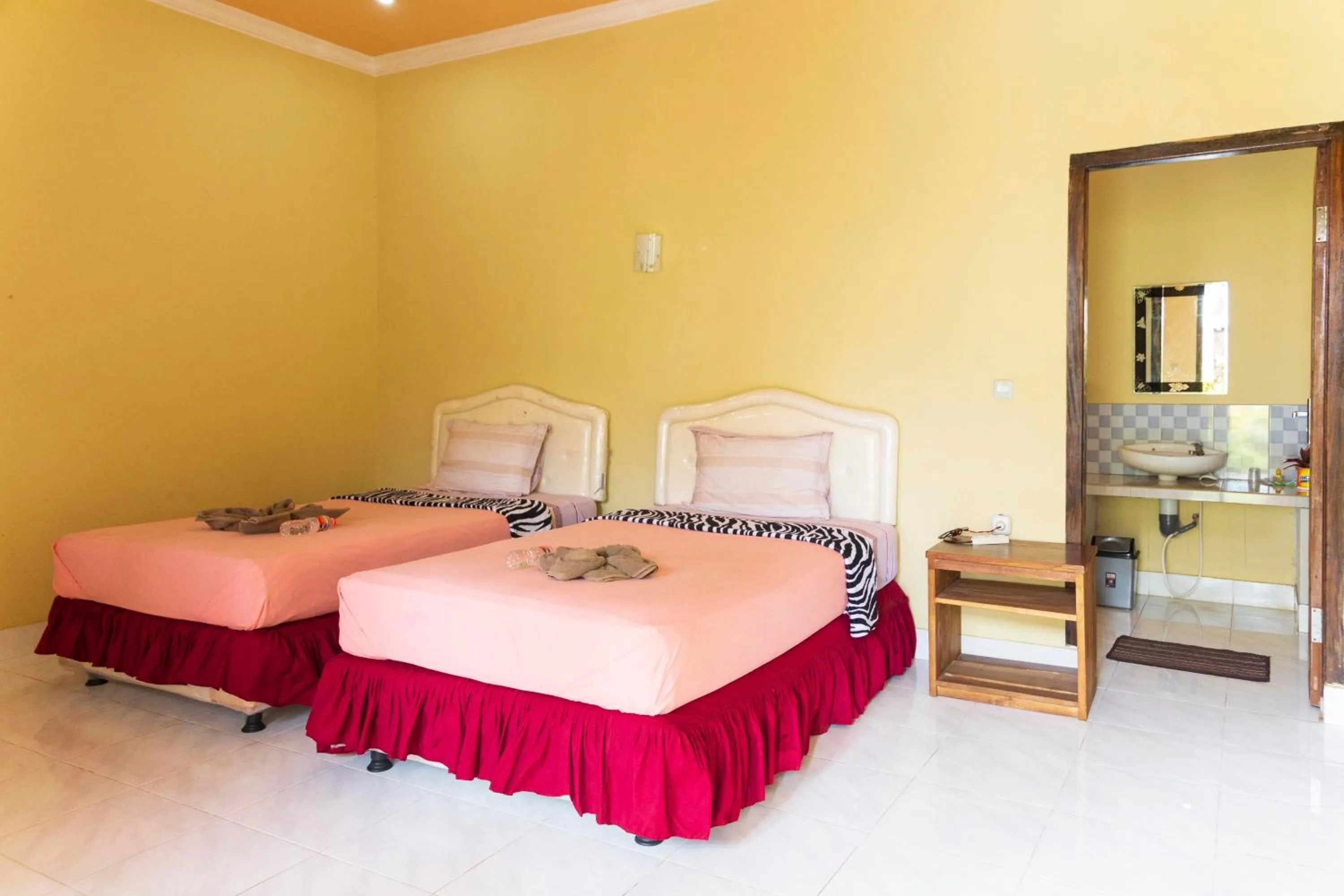 Bed in Pondok Guru Bakti Cottage