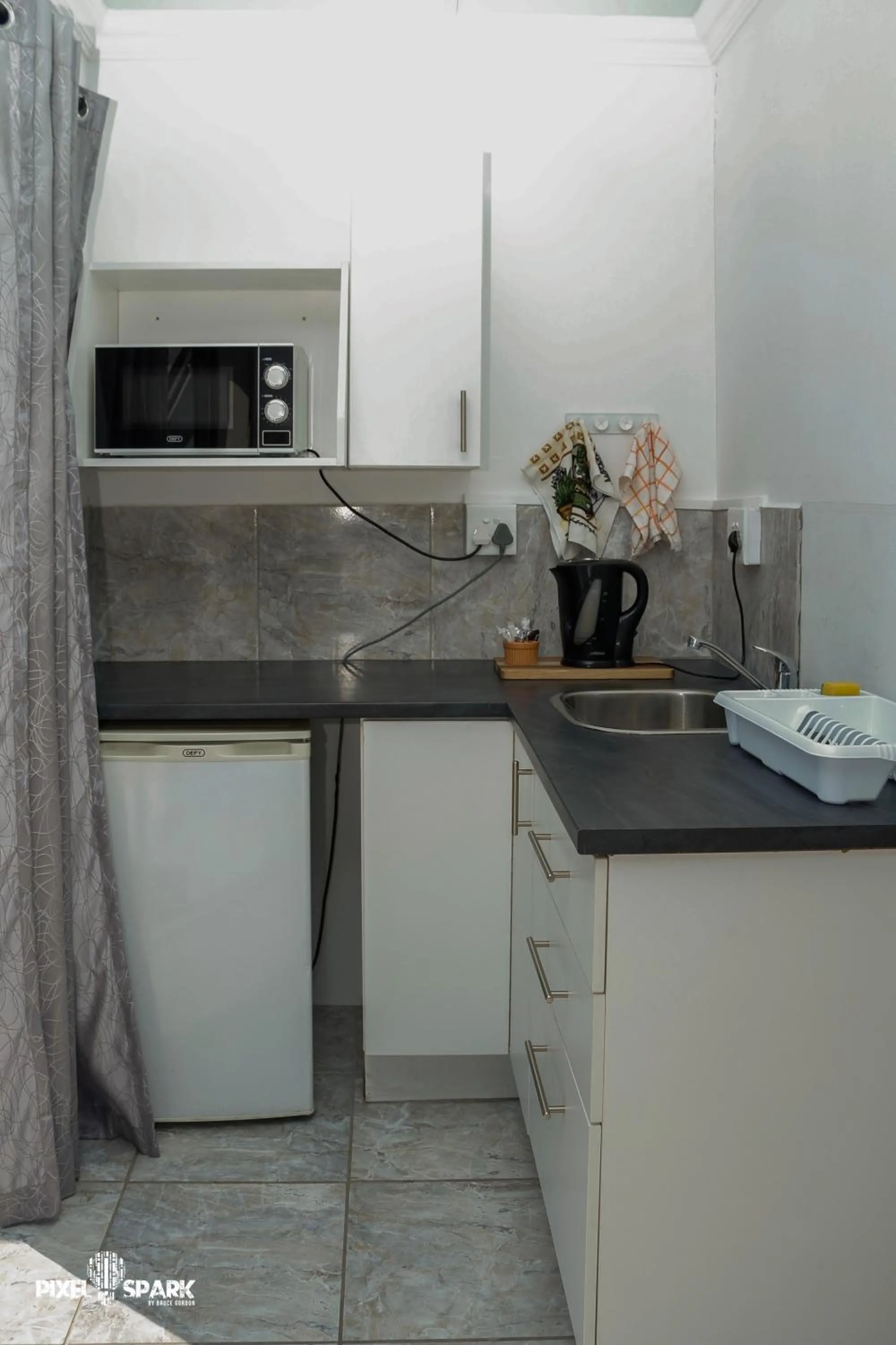 Kitchen or kitchenette in Tyday Accommodation